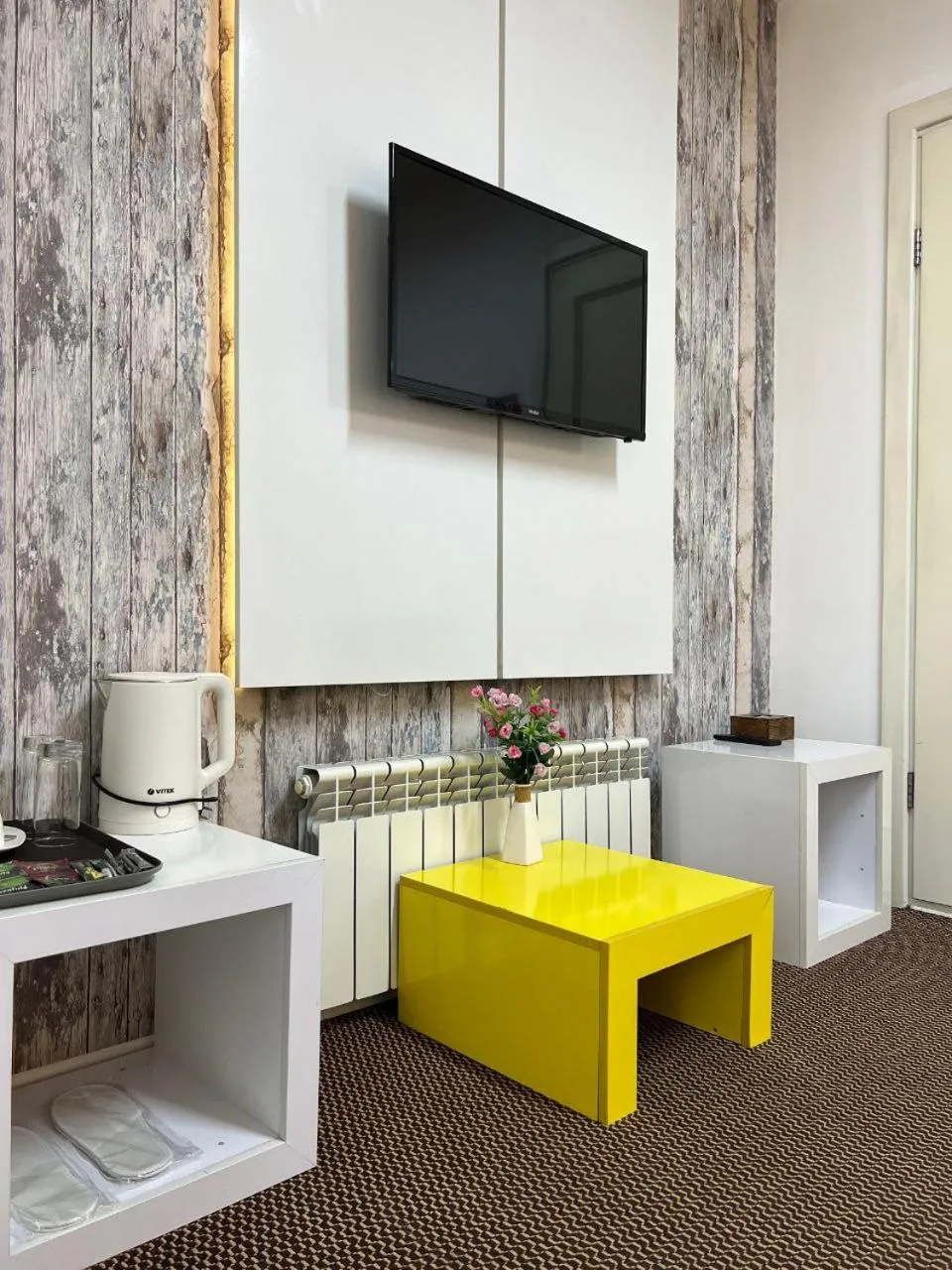 TV and multimedia in iO Boutique Hotel Bishkek