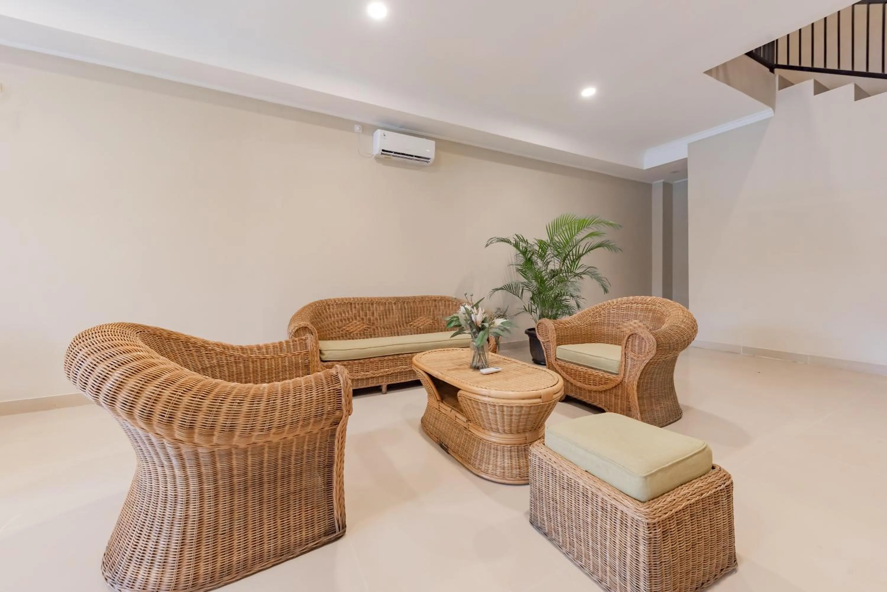 Living room in RedDoorz Plus near Surapati Core