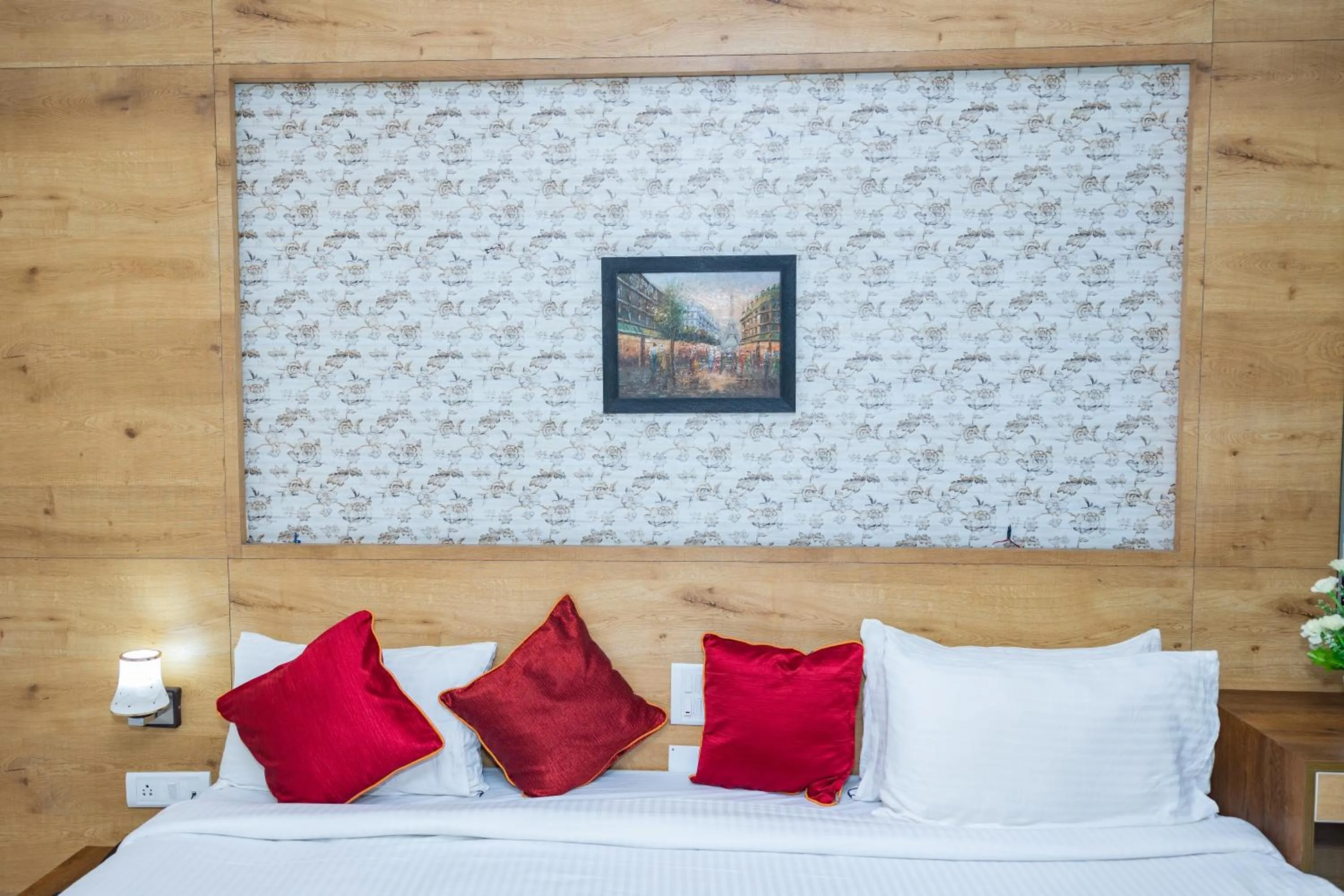 Bed in Ishwerya Suites