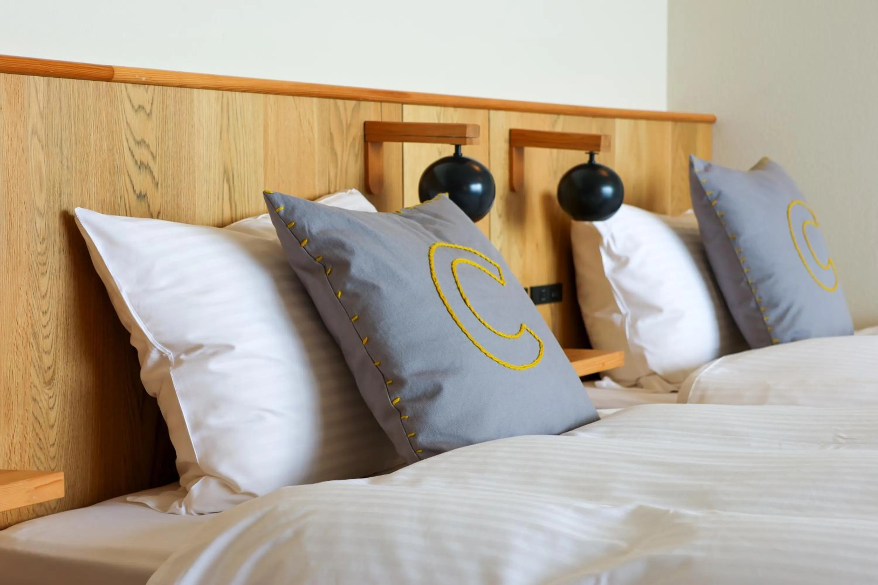 Bed in KAMOME SLOW HOTEL the COMPACT