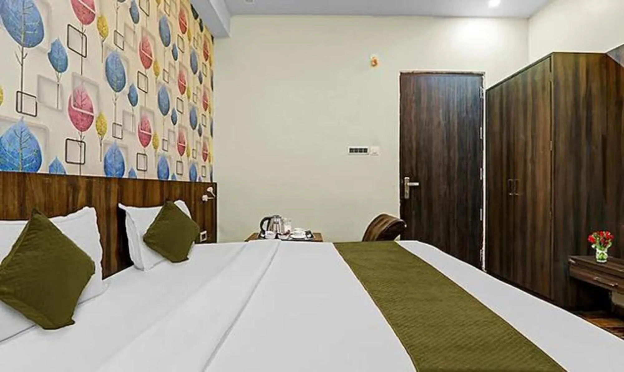 Bed in FabHotel Sam Inn