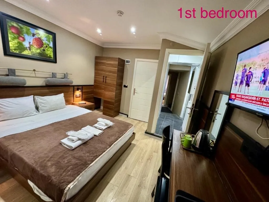 Bed in Aram Kerasi Rooms