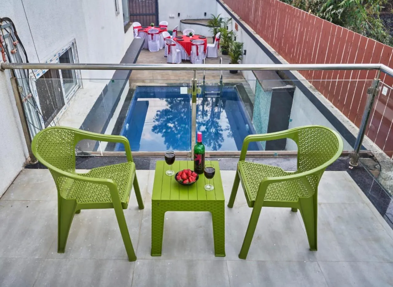 Patio in Drizzle Resort with Swimming pool Near Maapro Garden