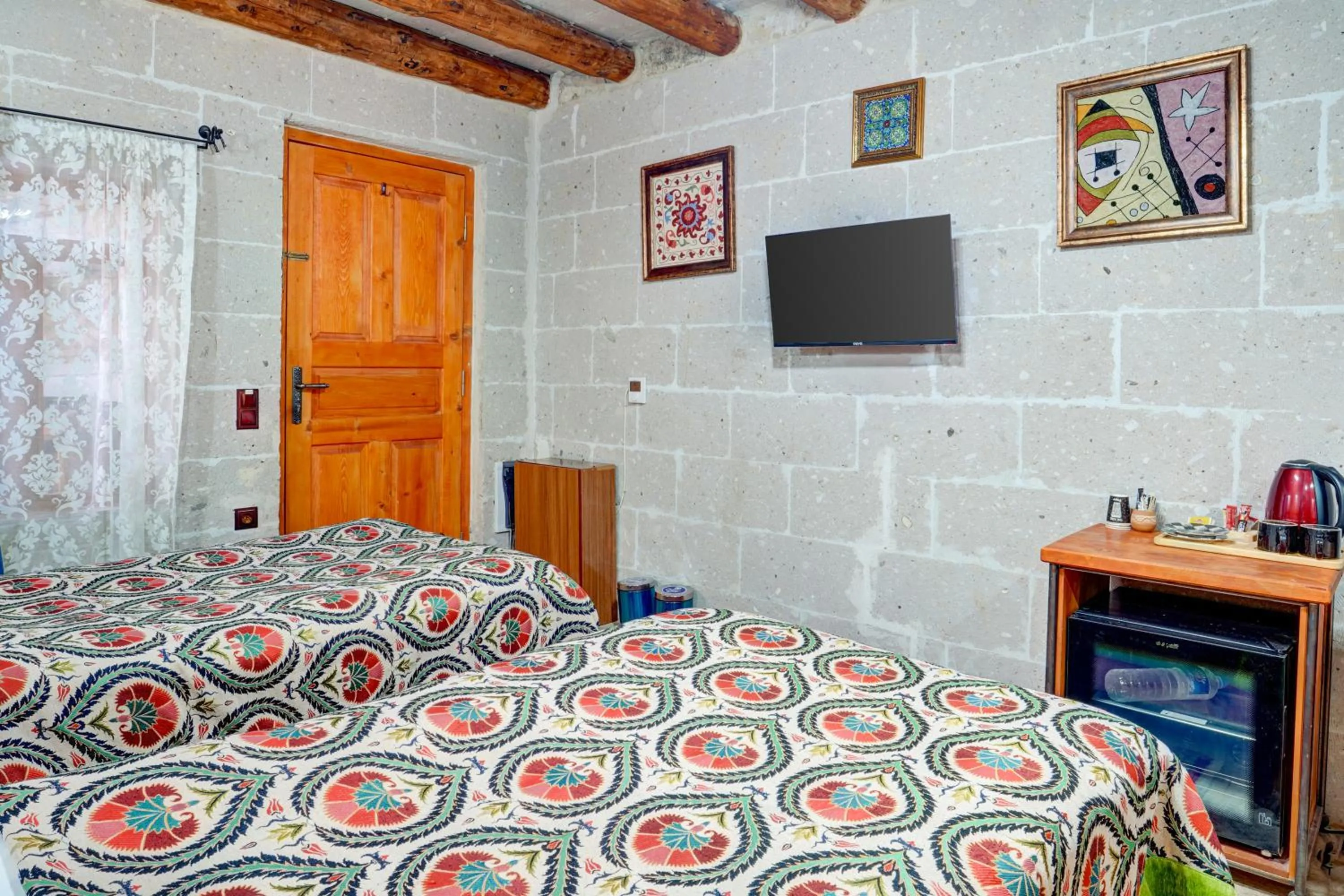 Bed in Atax Cave House