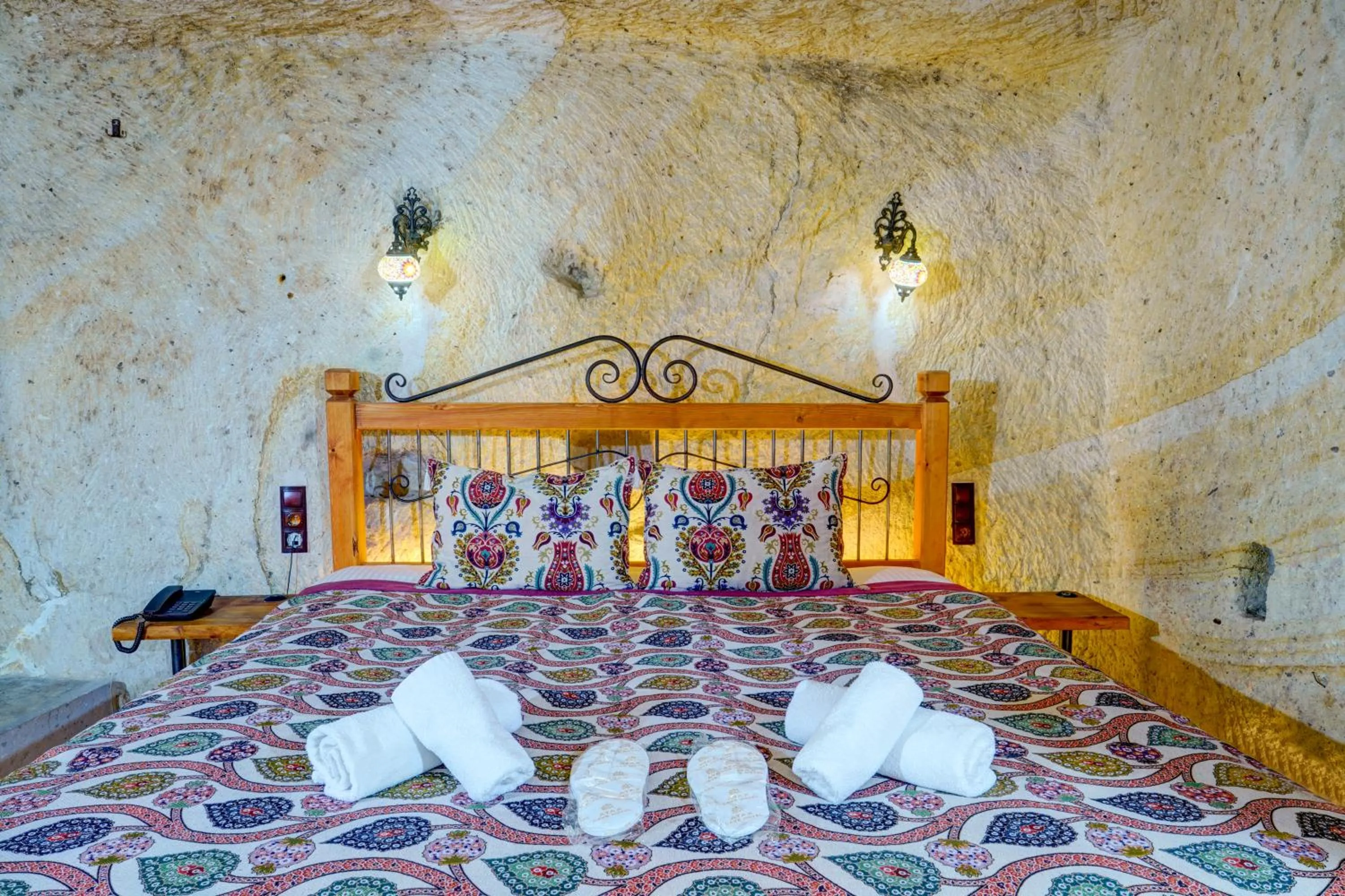 Bed in Atax Cave House