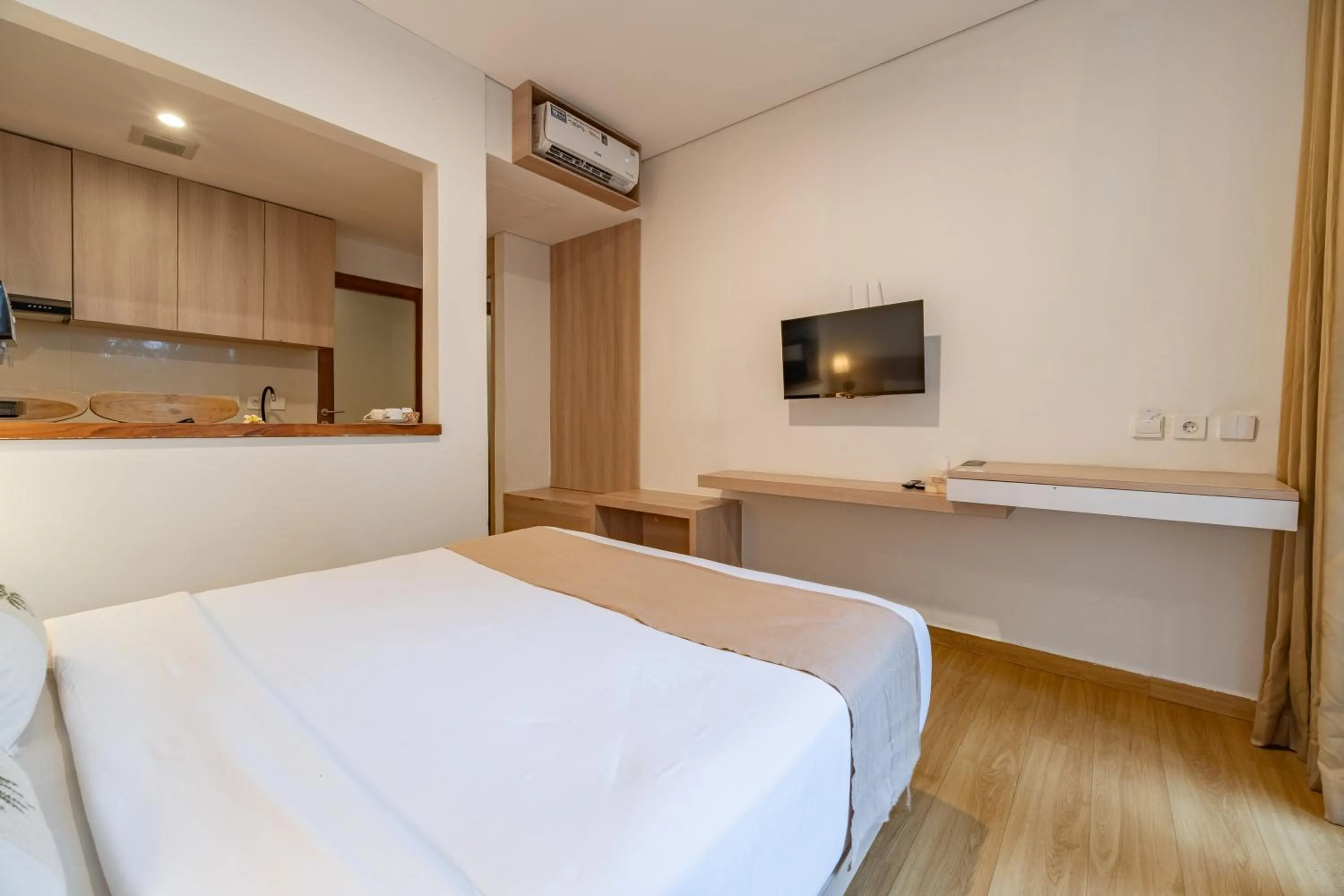 Bed in The Hita Apartement