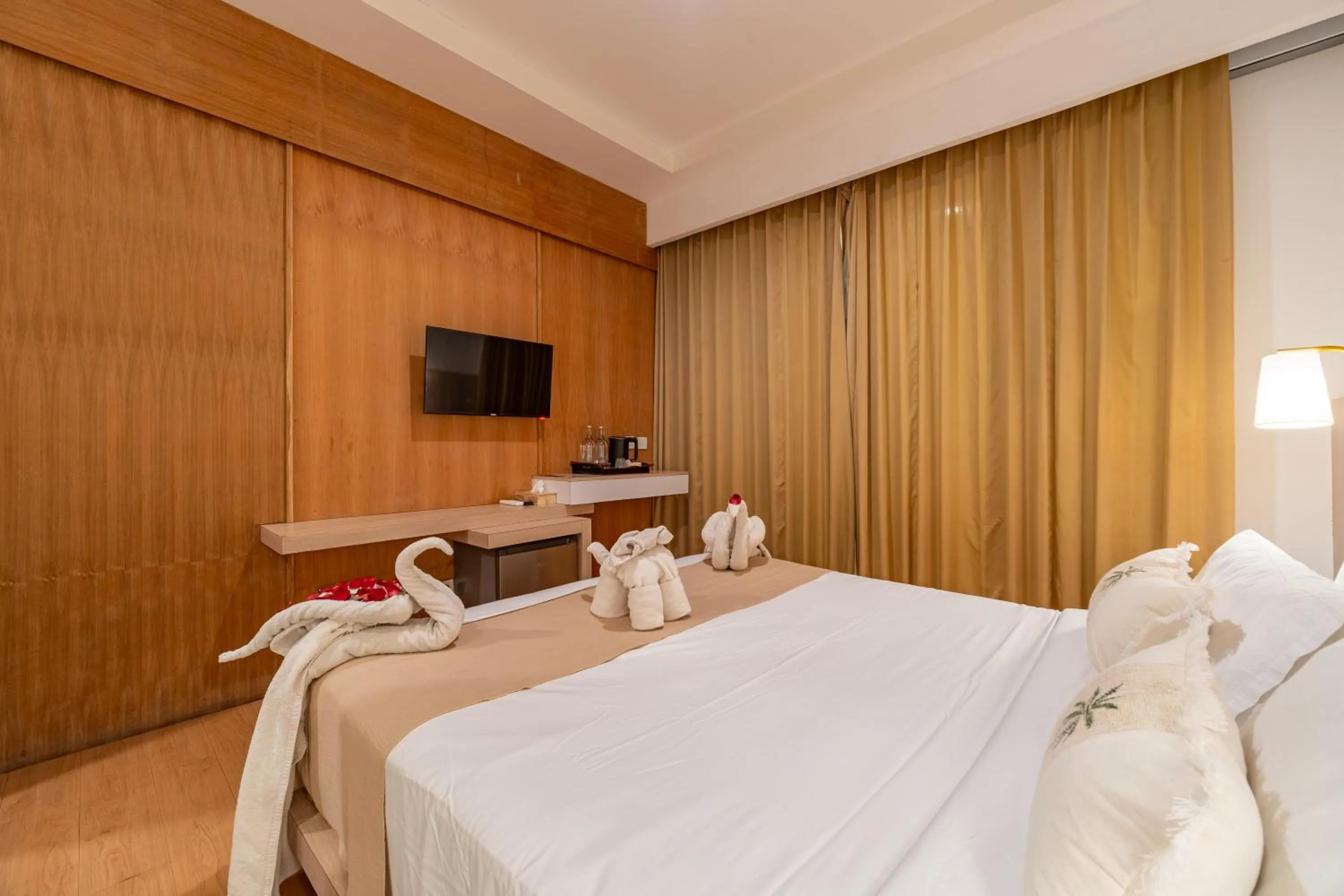 Bed in The Hita Apartement