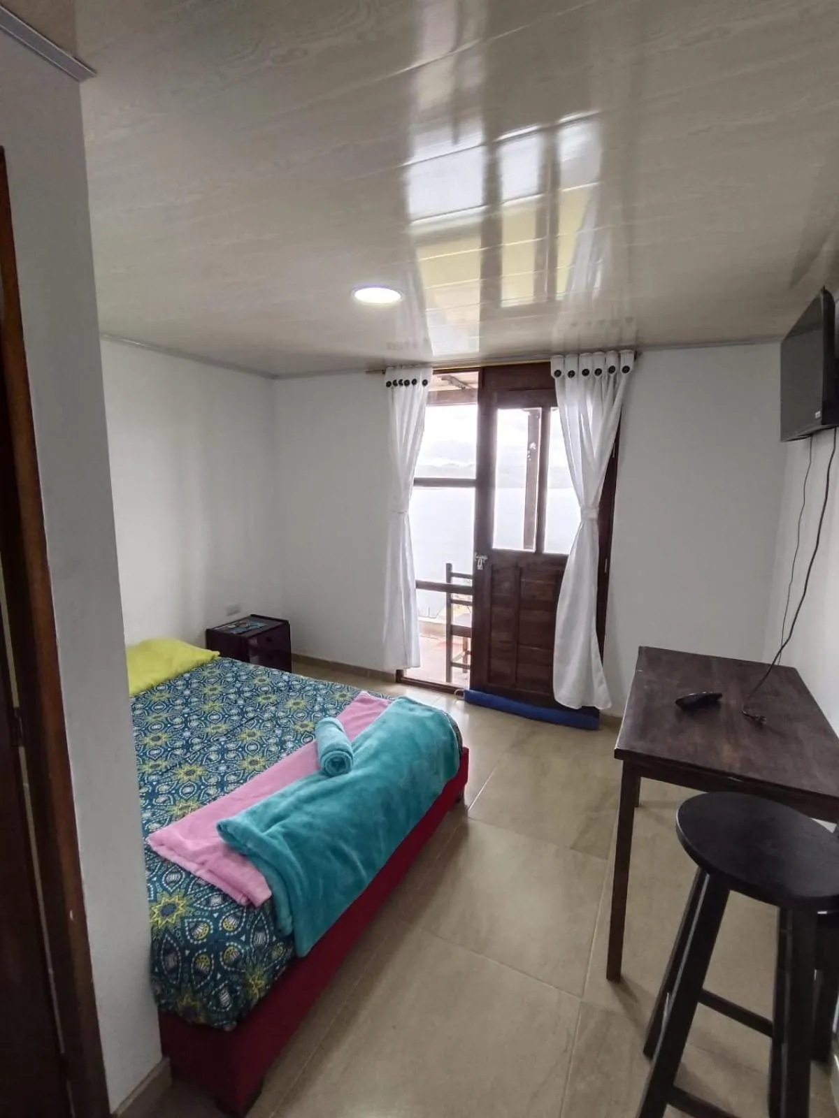 Bed in HOTEL TOTA ELISEO PLAYA BLANCA LAGO DE TOTA