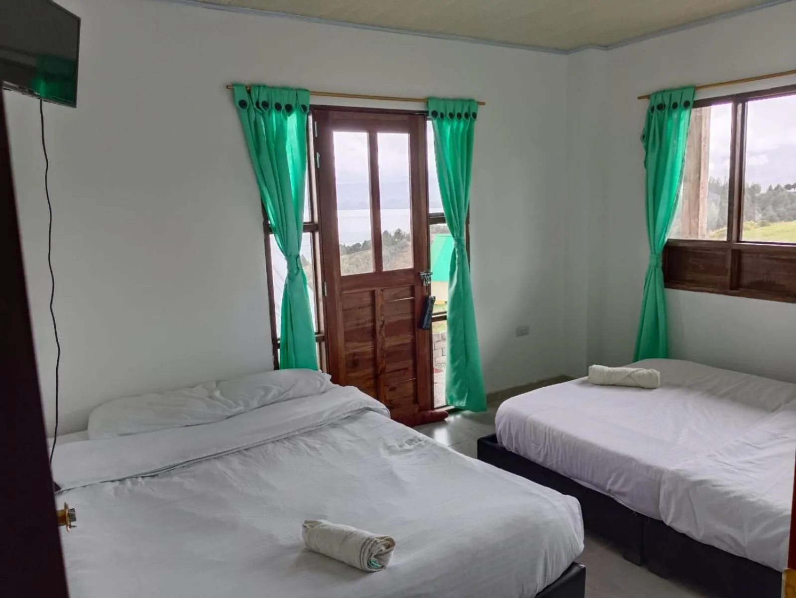 Bed in HOTEL TOTA ELISEO PLAYA BLANCA LAGO DE TOTA