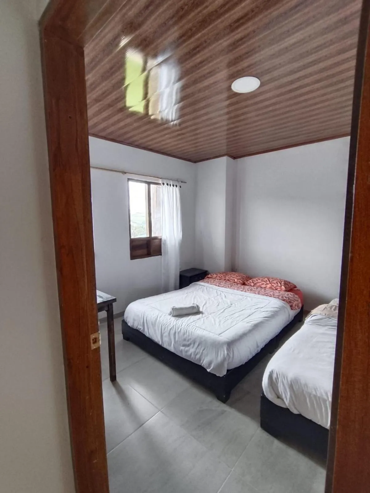 Bed in HOTEL TOTA ELISEO PLAYA BLANCA LAGO DE TOTA