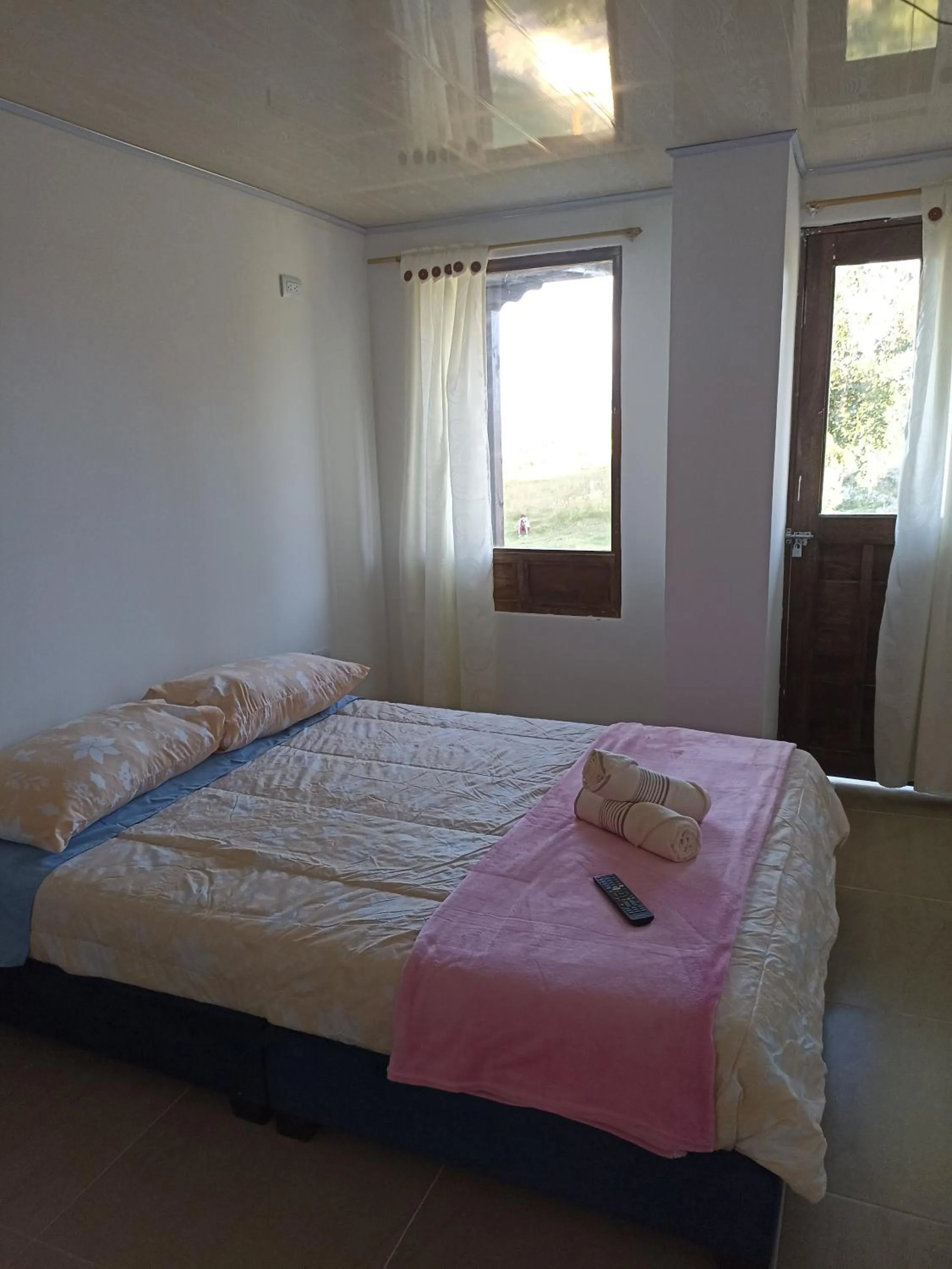 Bed in HOTEL TOTA ELISEO PLAYA BLANCA LAGO DE TOTA