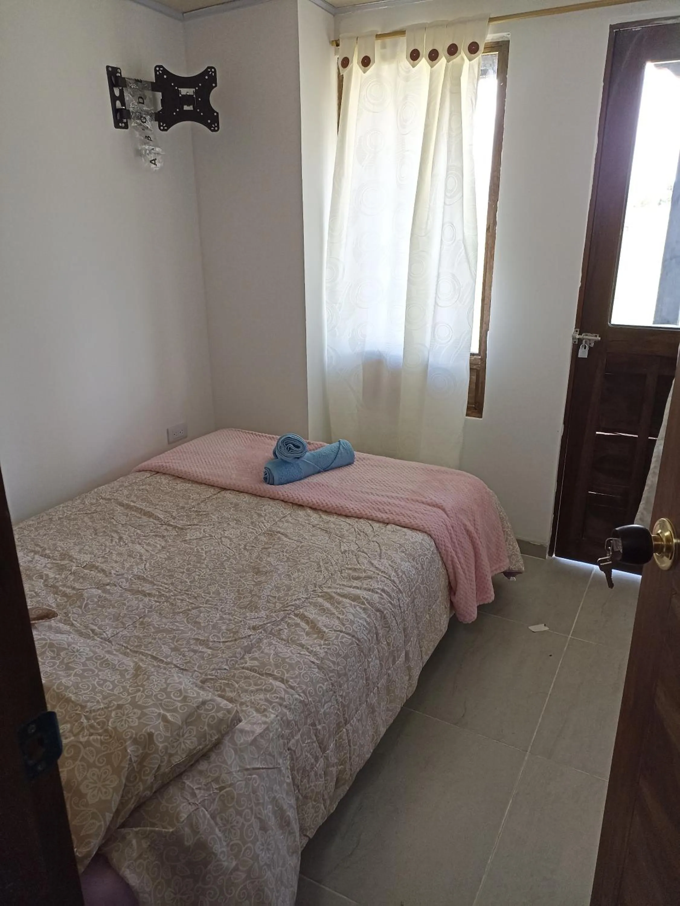 Bed in HOTEL TOTA ELISEO PLAYA BLANCA LAGO DE TOTA