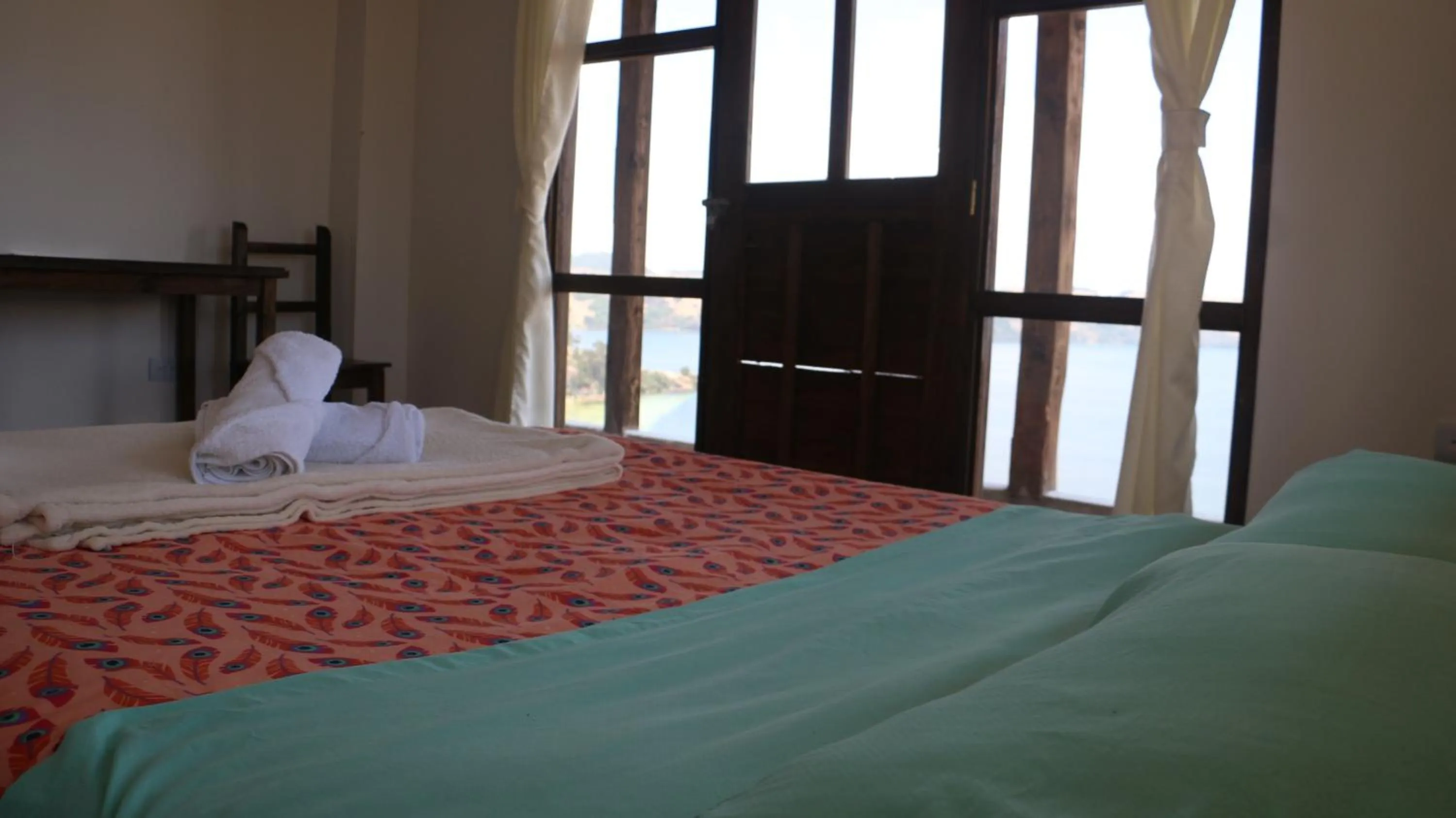 Bed in HOTEL TOTA ELISEO PLAYA BLANCA LAGO DE TOTA