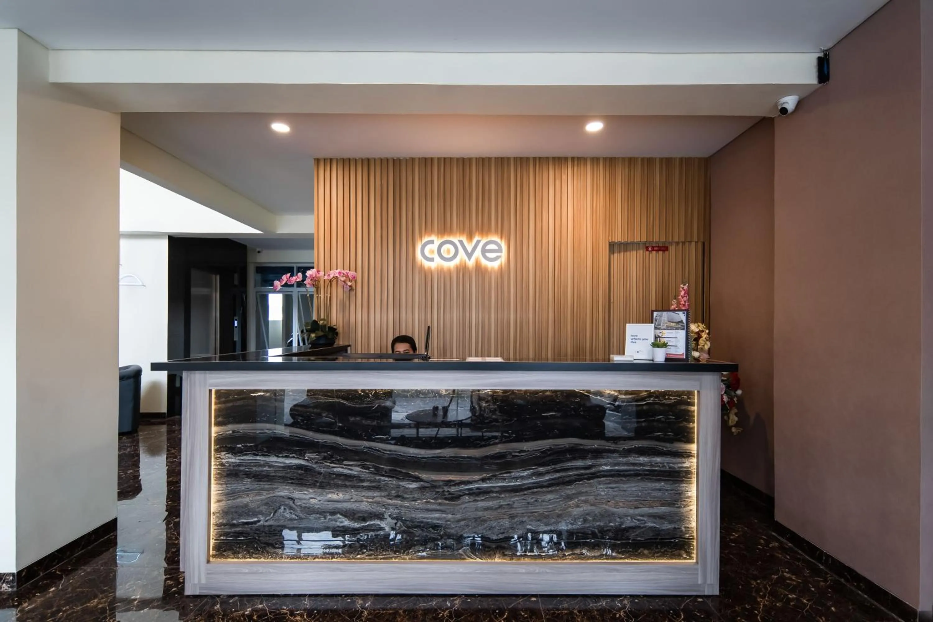 Property logo or sign in Cove West Inn Cihampelas