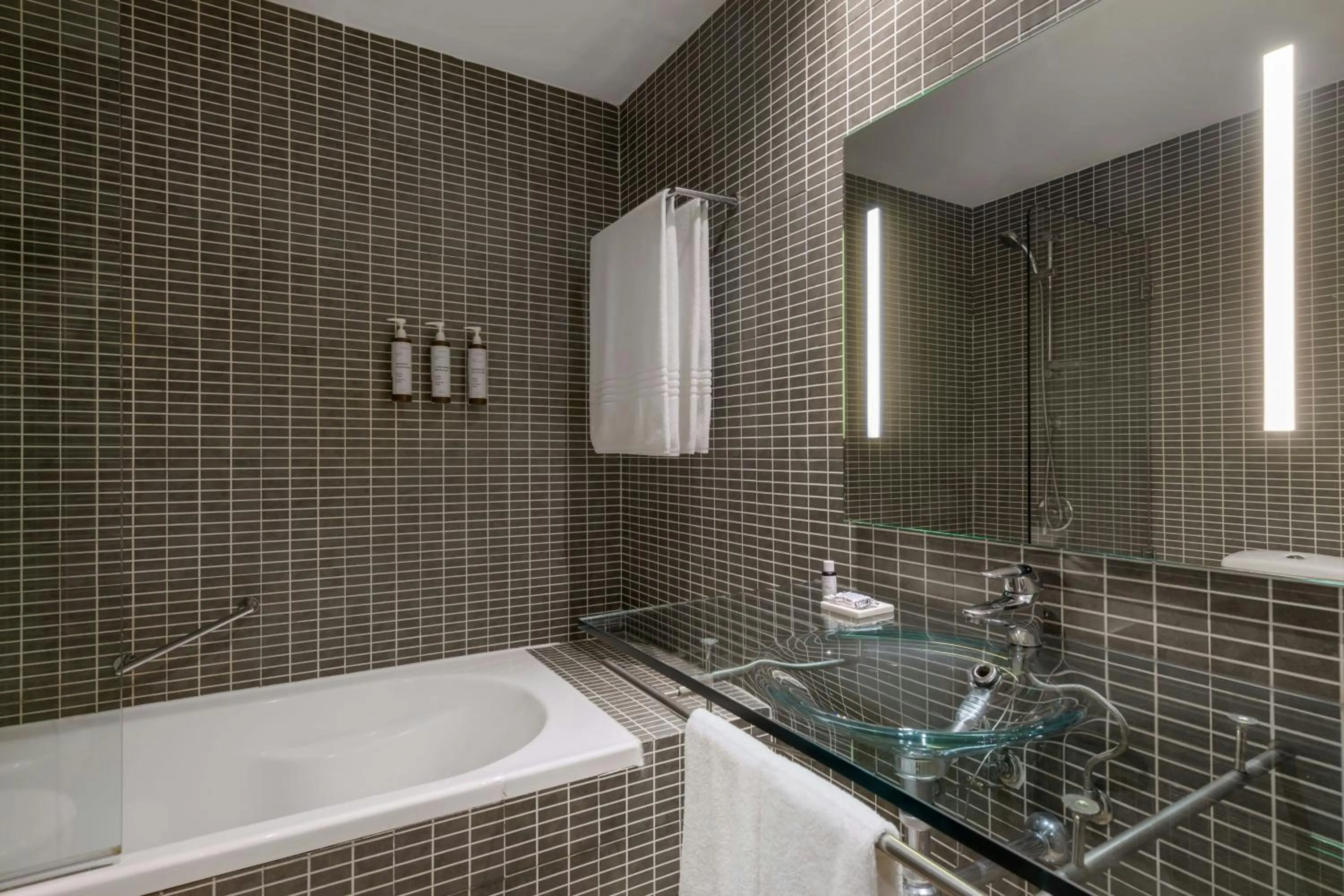 Bathroom in AC Hotel Madrid Feria by Marriott