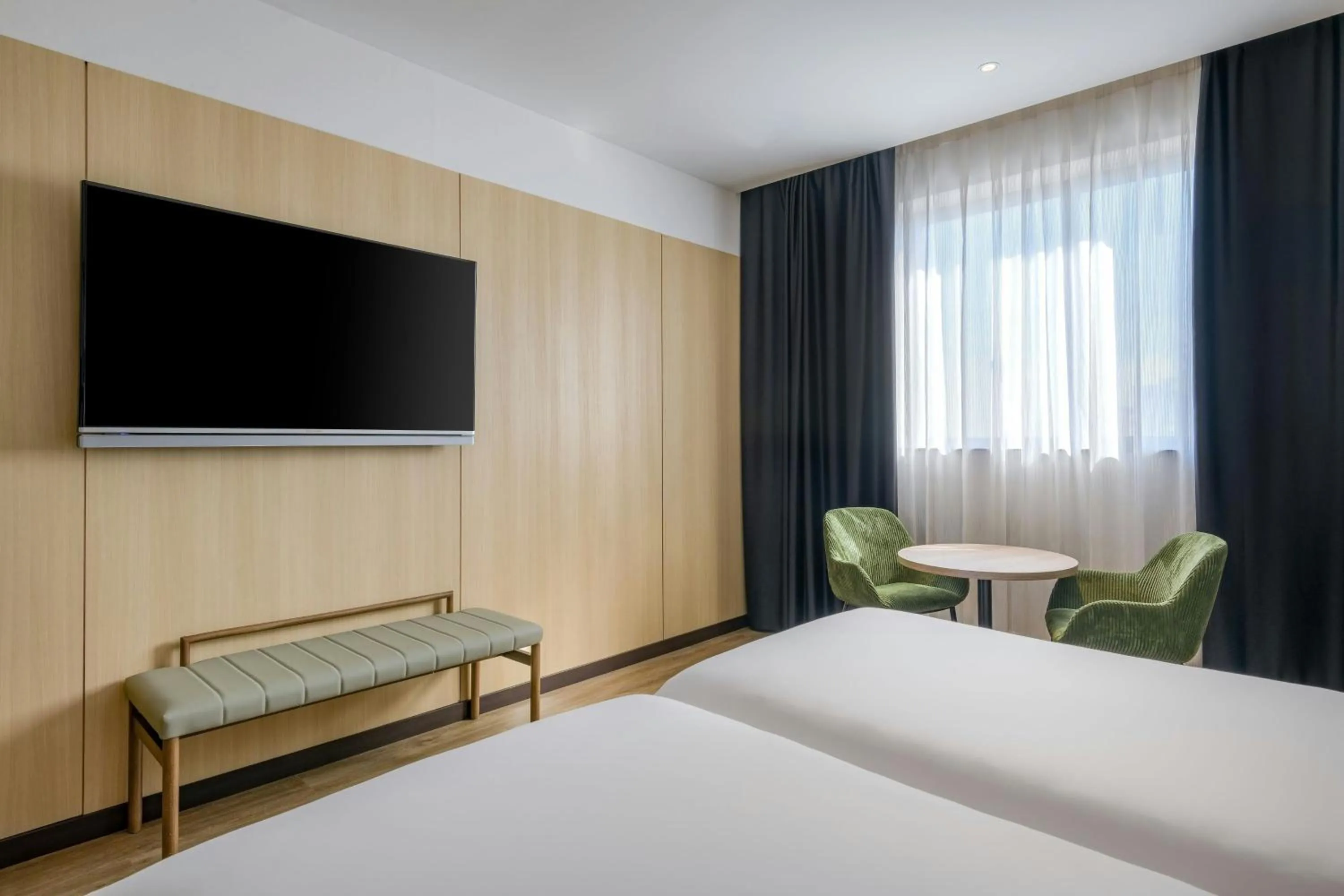 Photo of the whole room, Bed in AC Hotel Madrid Feria by Marriott