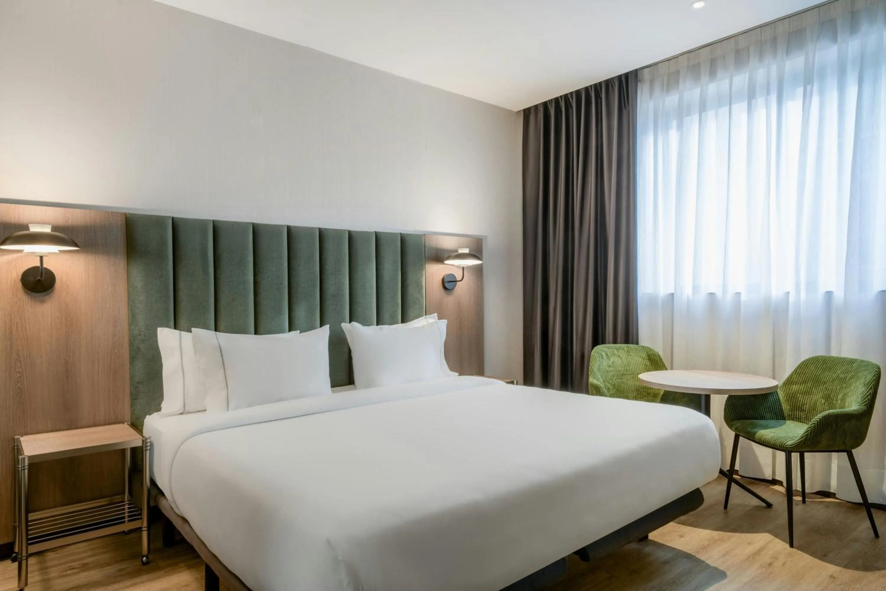 Photo of the whole room, Bed in AC Hotel Madrid Feria by Marriott