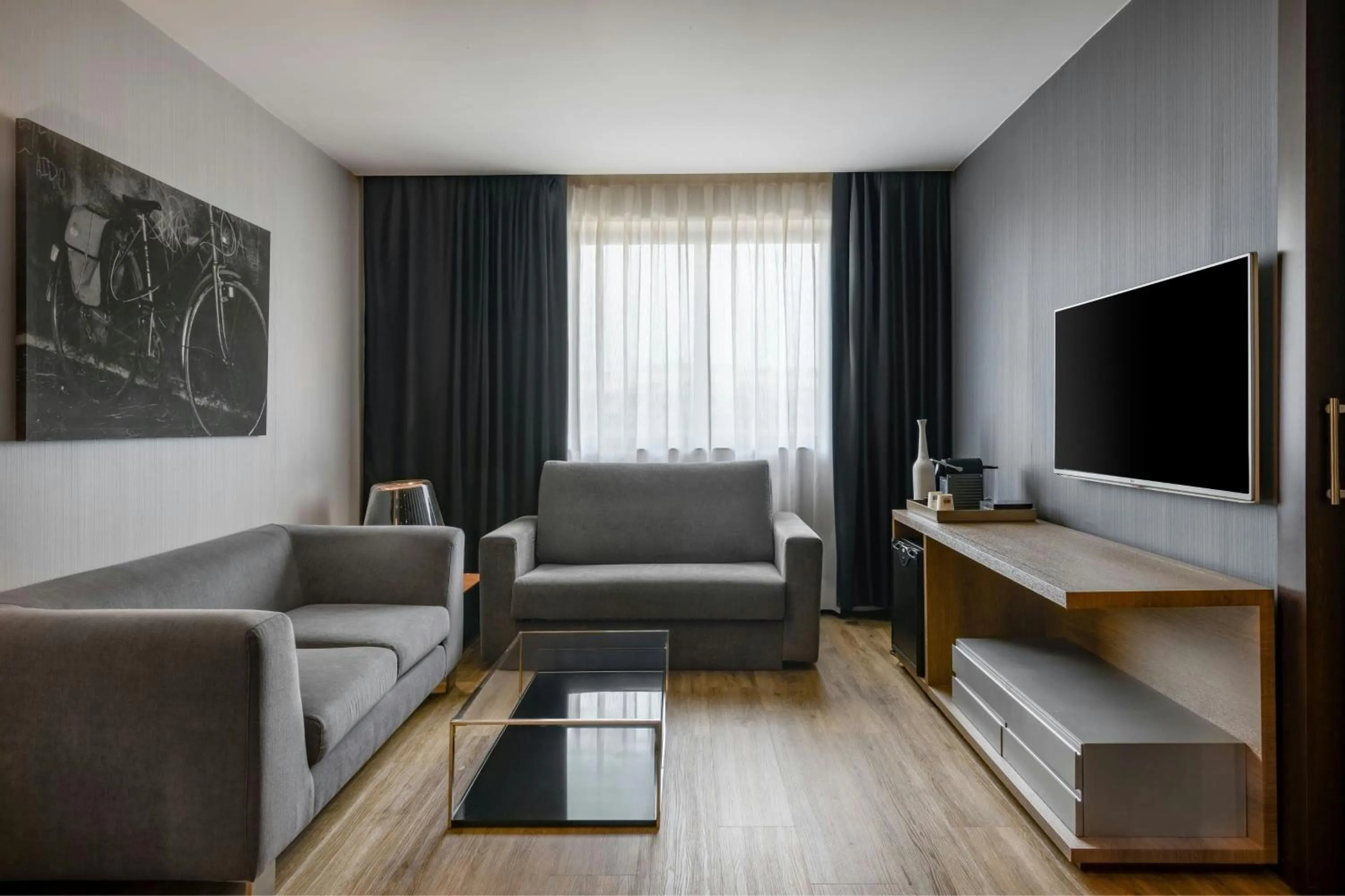 Living room in AC Hotel Madrid Feria by Marriott