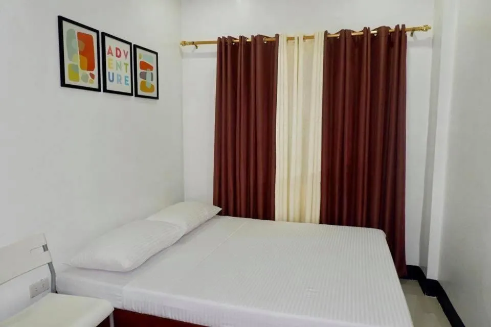 Bed in Endless Summer Hotel Baler