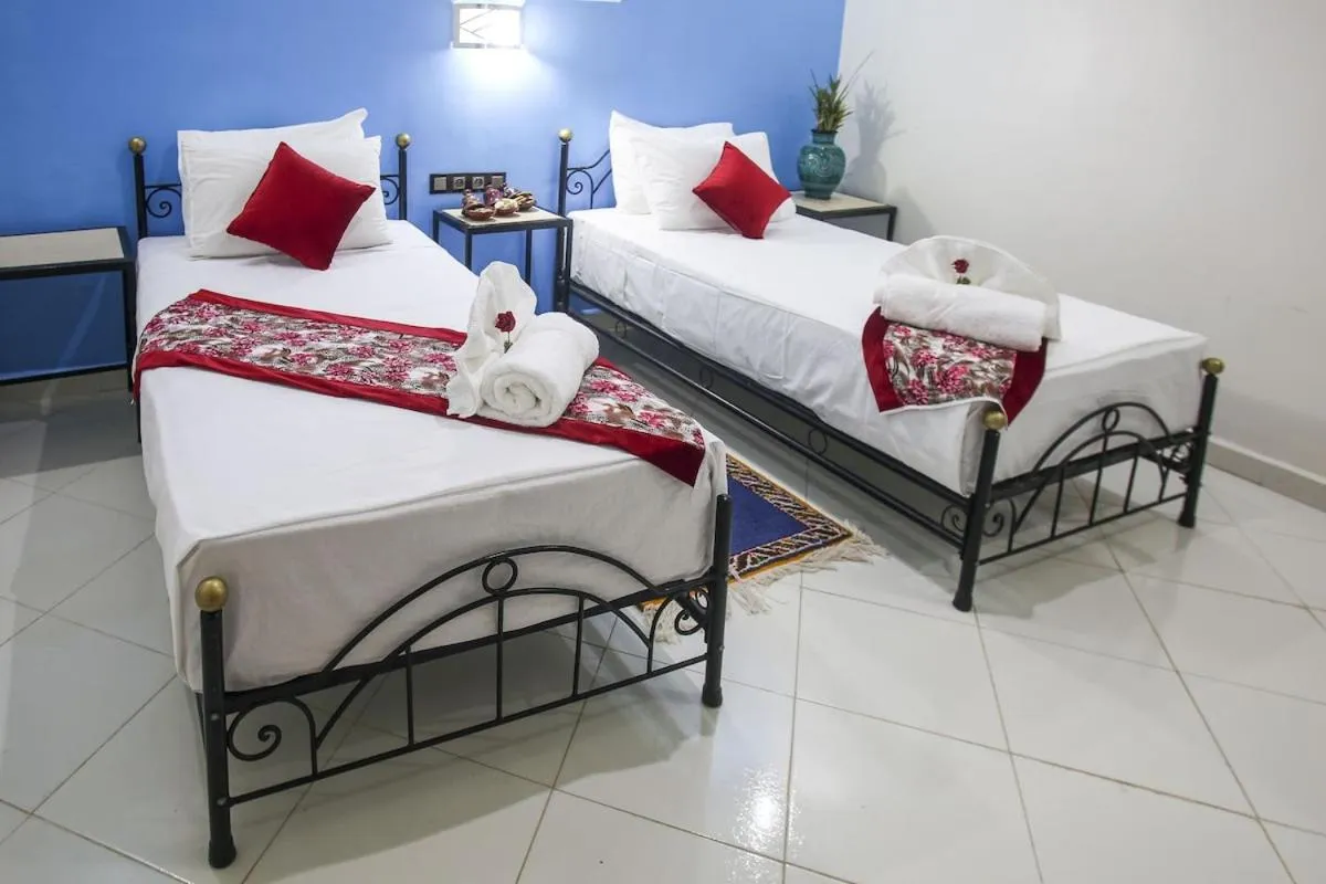 Bed in HOTEL LA POMME ZAIDA