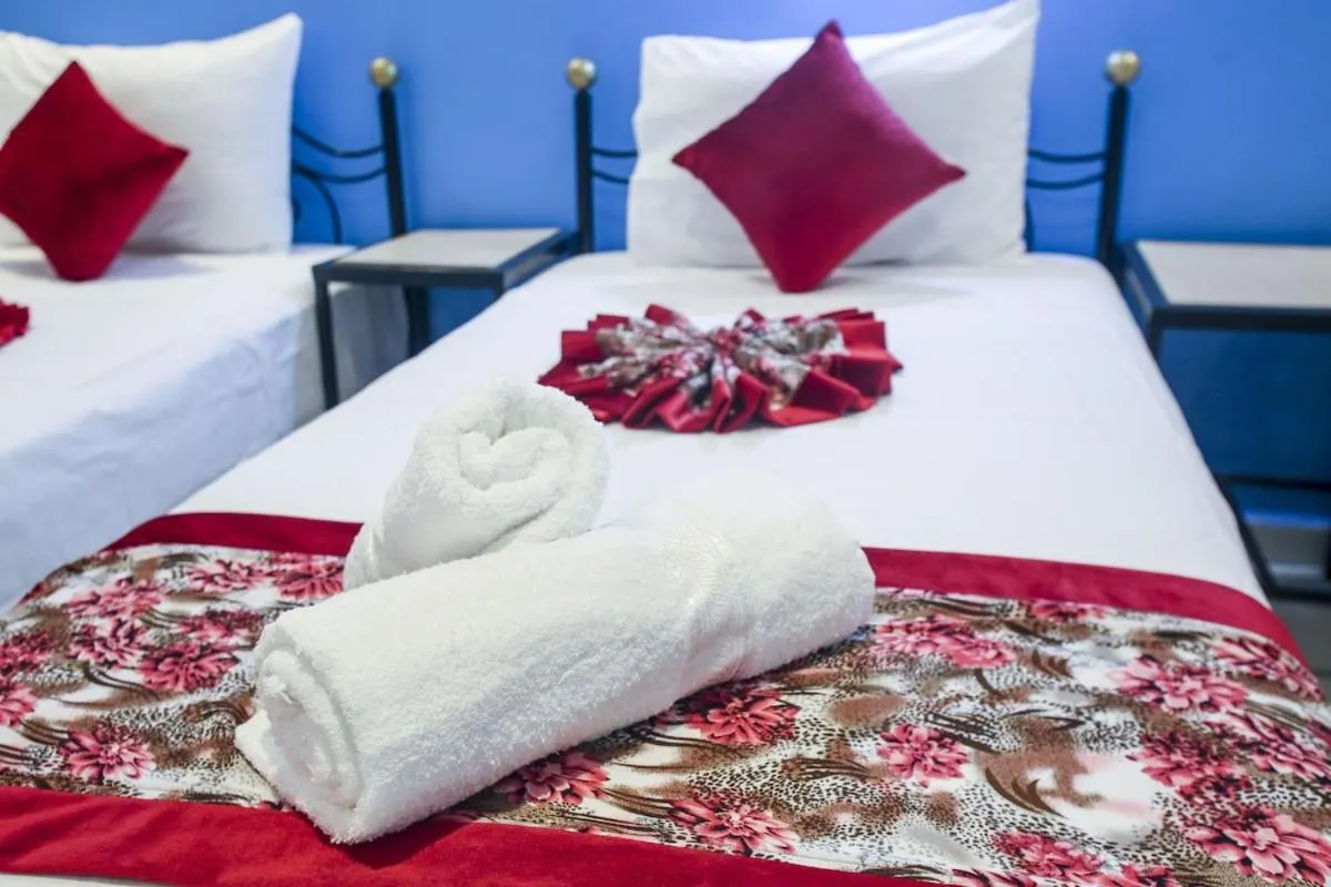 Bed in HOTEL LA POMME ZAIDA