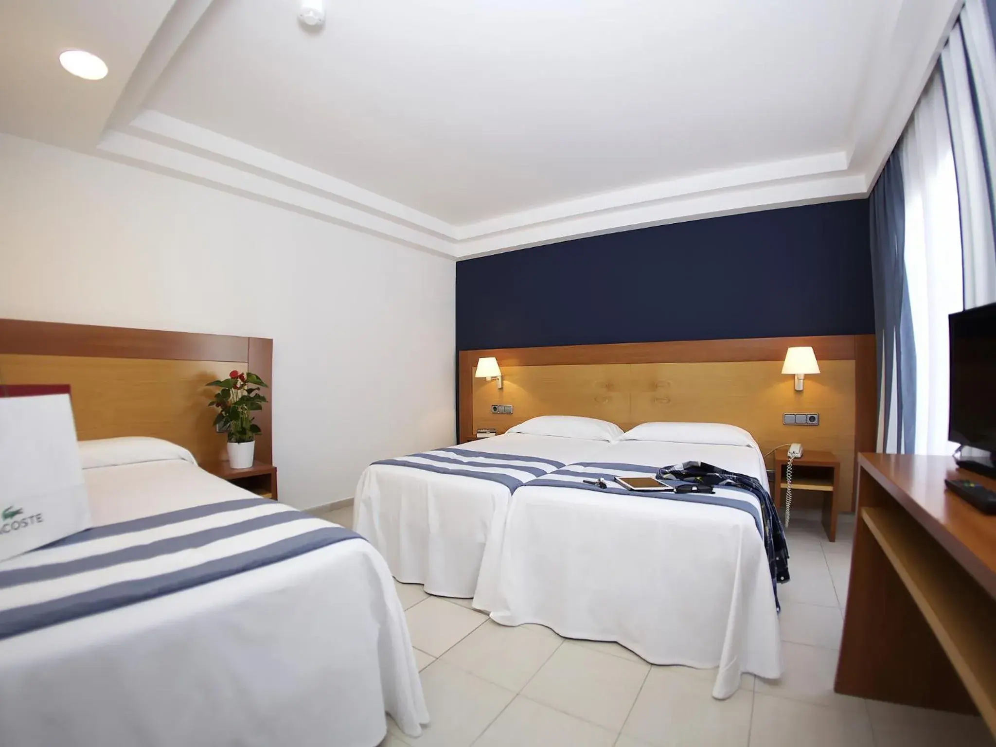 Basic Triple Room (3 Adults) Without Balcony in Hotel Els Pins Basic Triple Room (3 Adults) Without Balcony in Hotel Els Pins