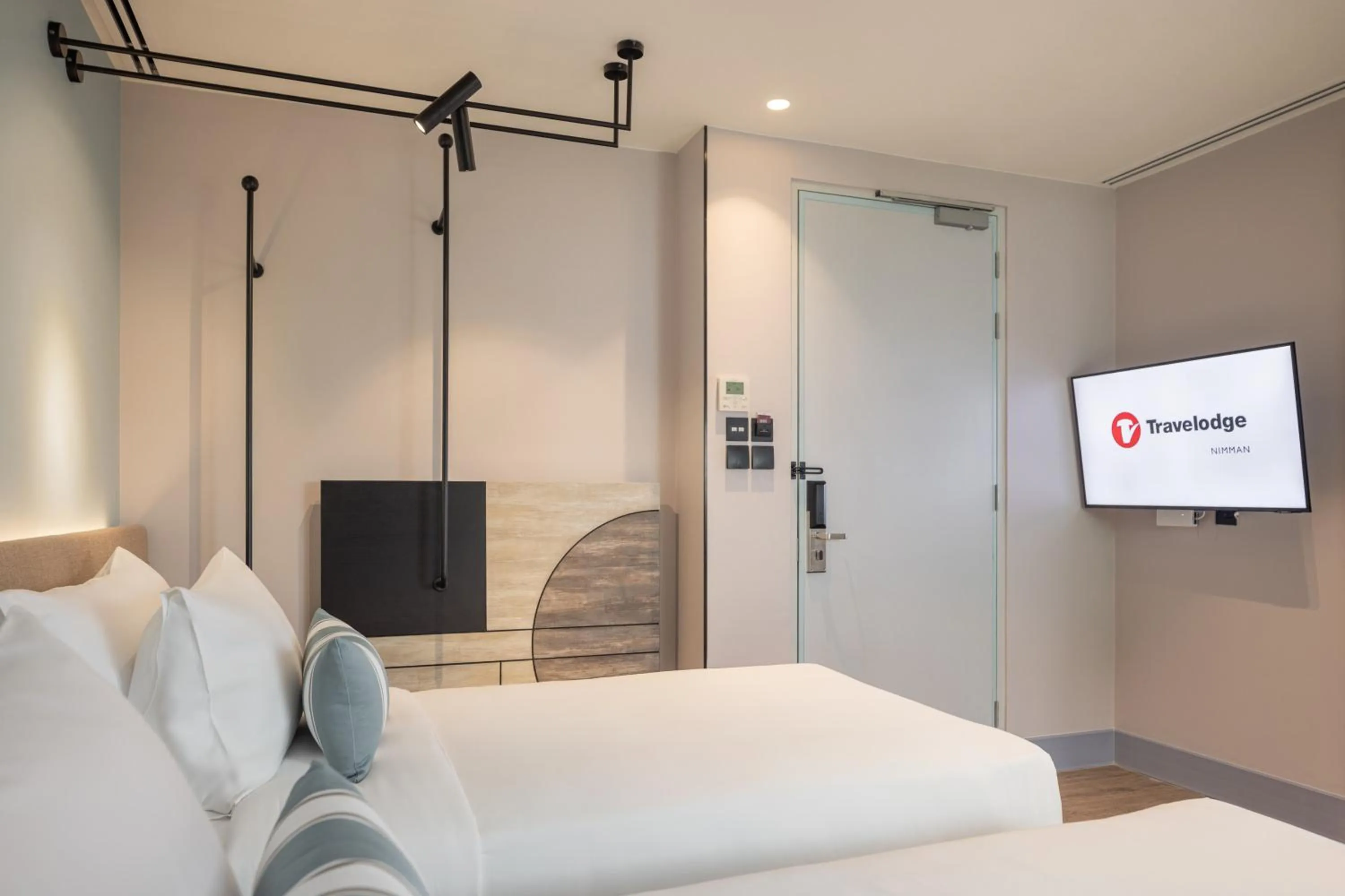 Photo of the whole room, Bed in Travelodge Nimman