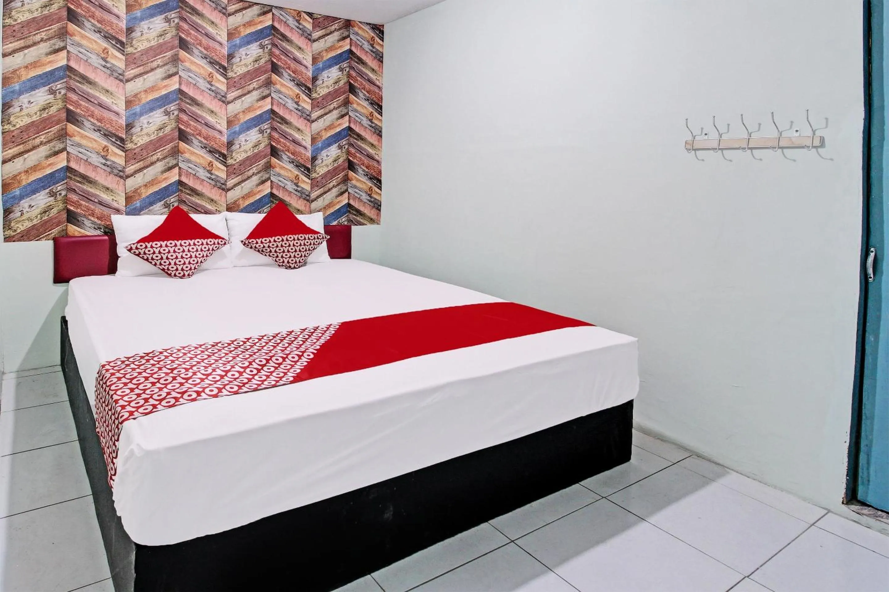 Bedroom, Bed in OYO Life 92032 Utama Hotel & Karaoke