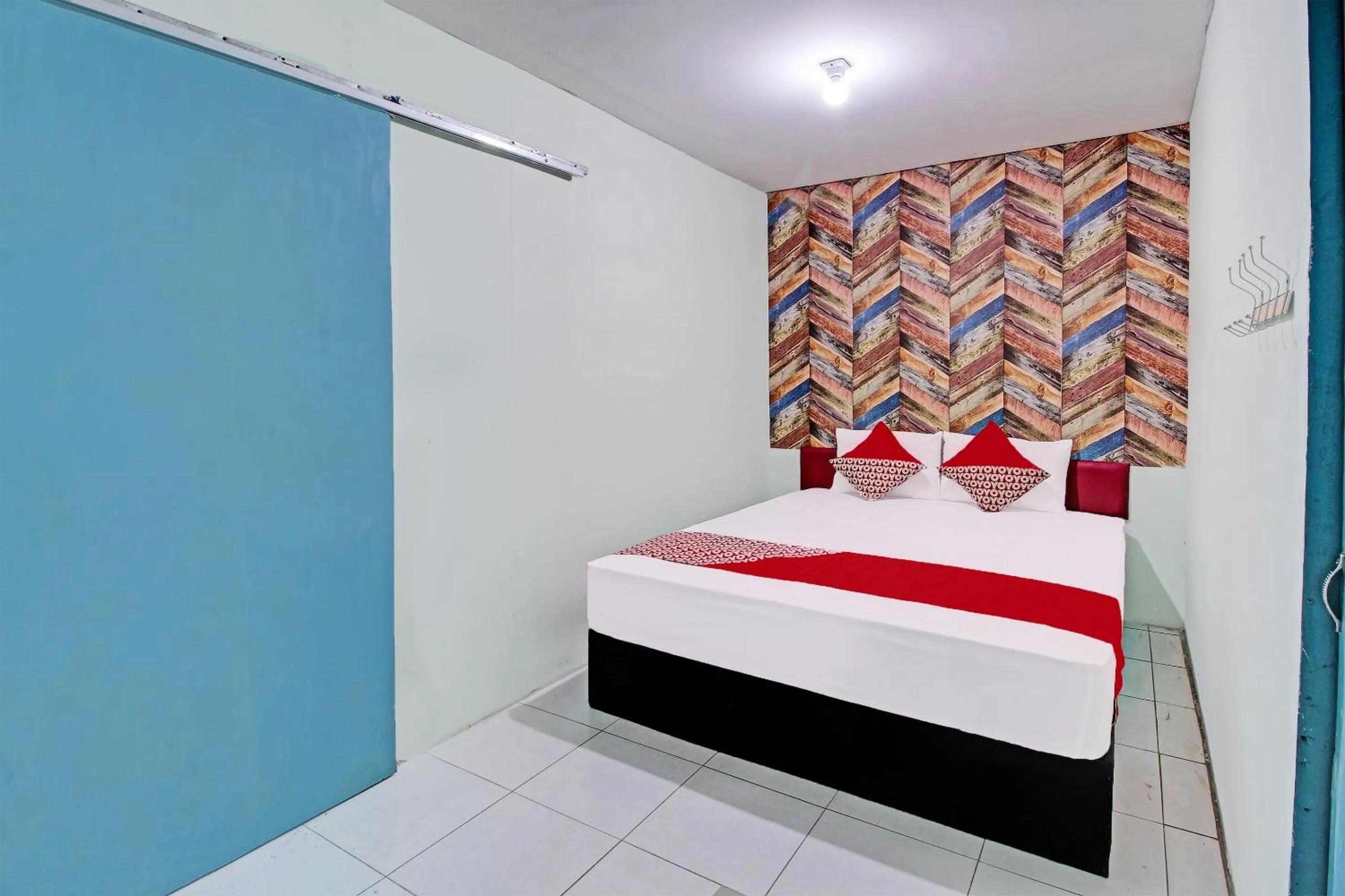 Bedroom, Bed in OYO Life 92032 Utama Hotel & Karaoke