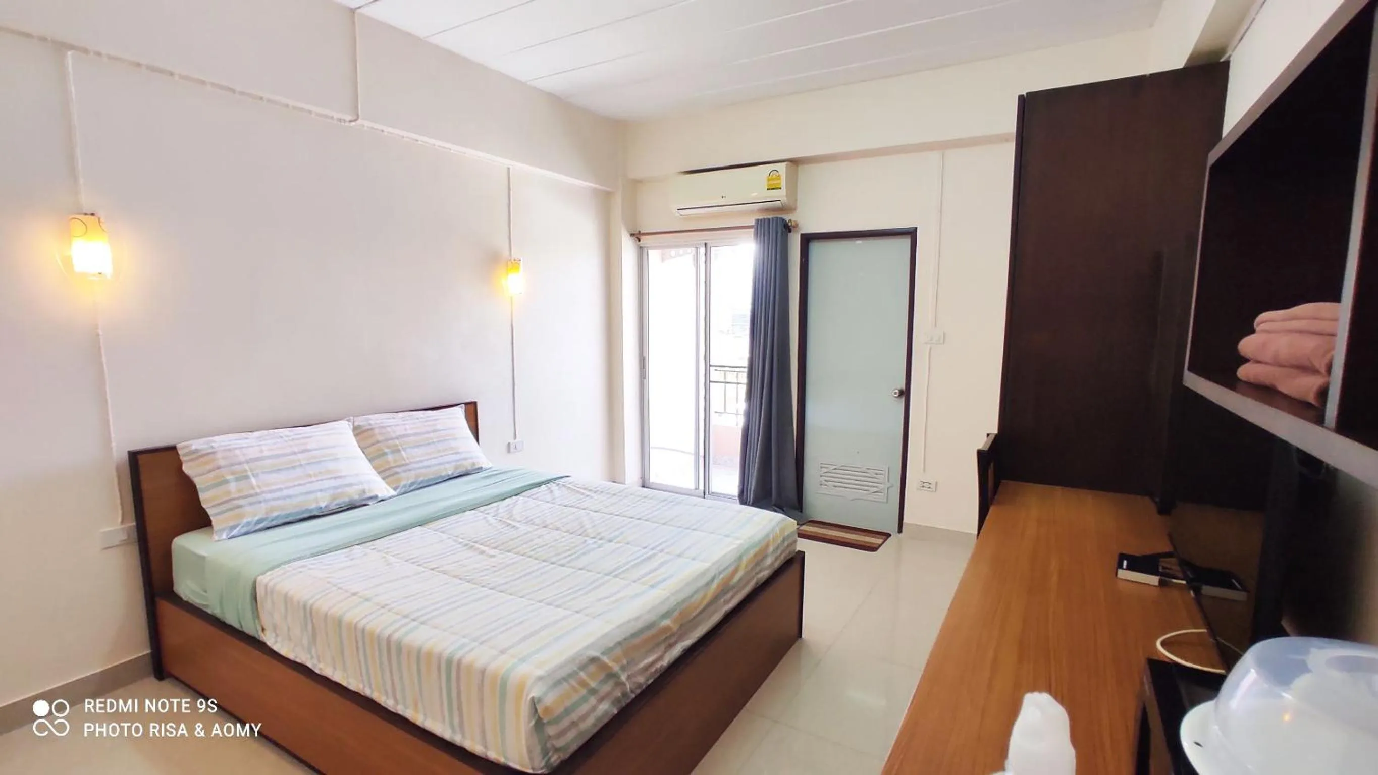 TV and multimedia, Bed in 66 Apartment