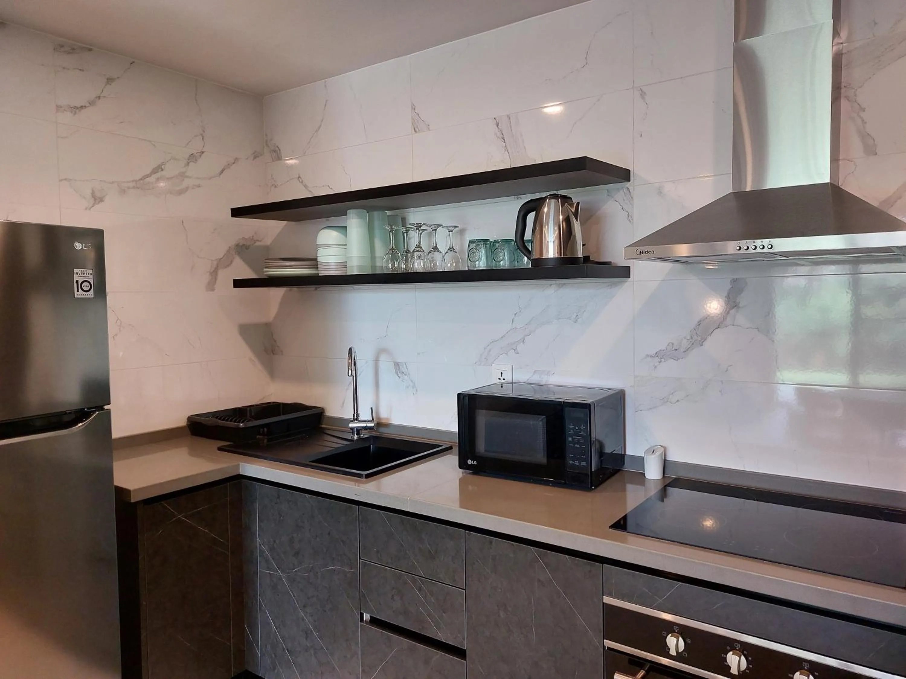 Kitchen or kitchenette in Kololi Sands Apartments