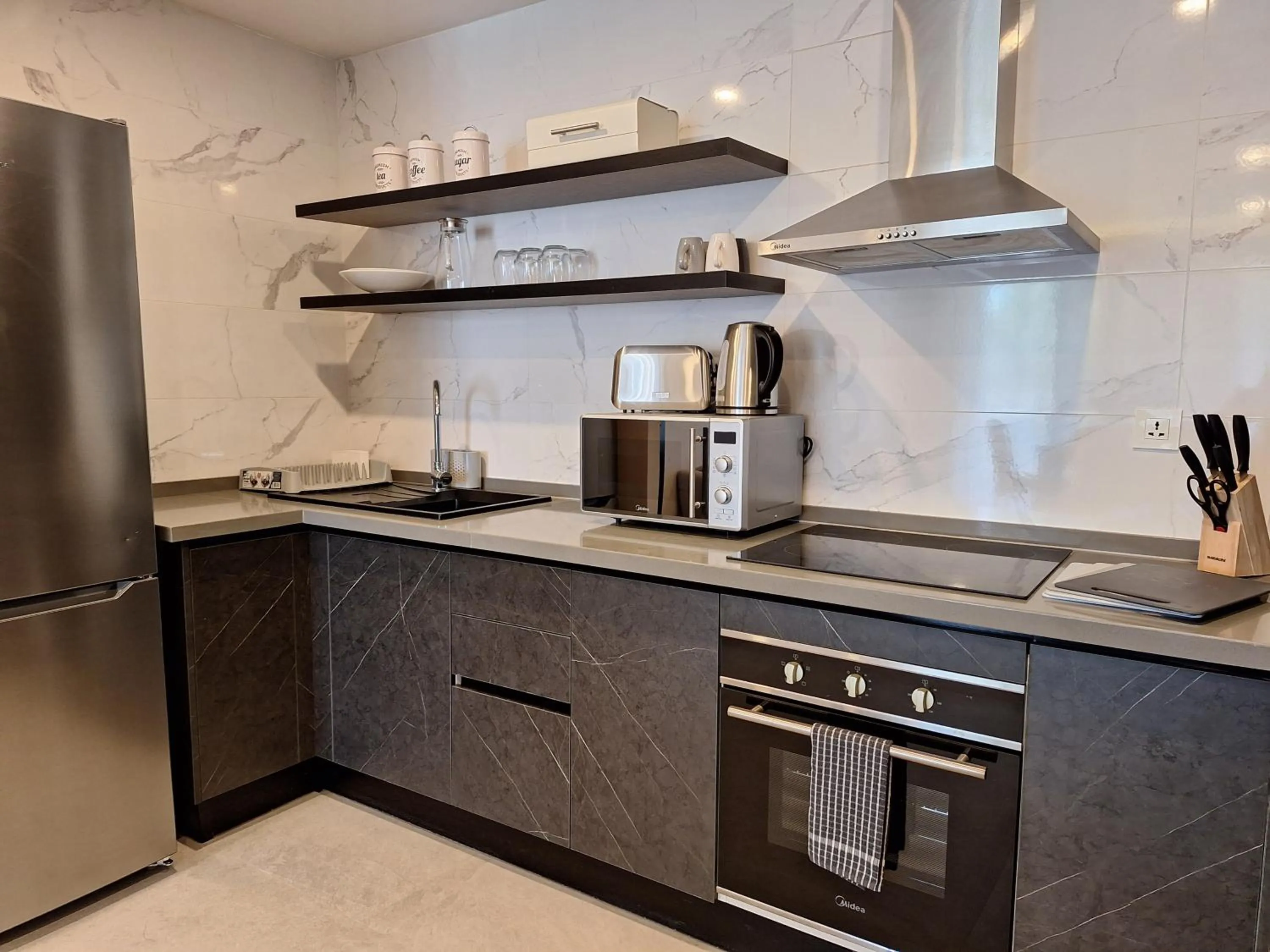 Kitchen or kitchenette in Kololi Sands Apartments