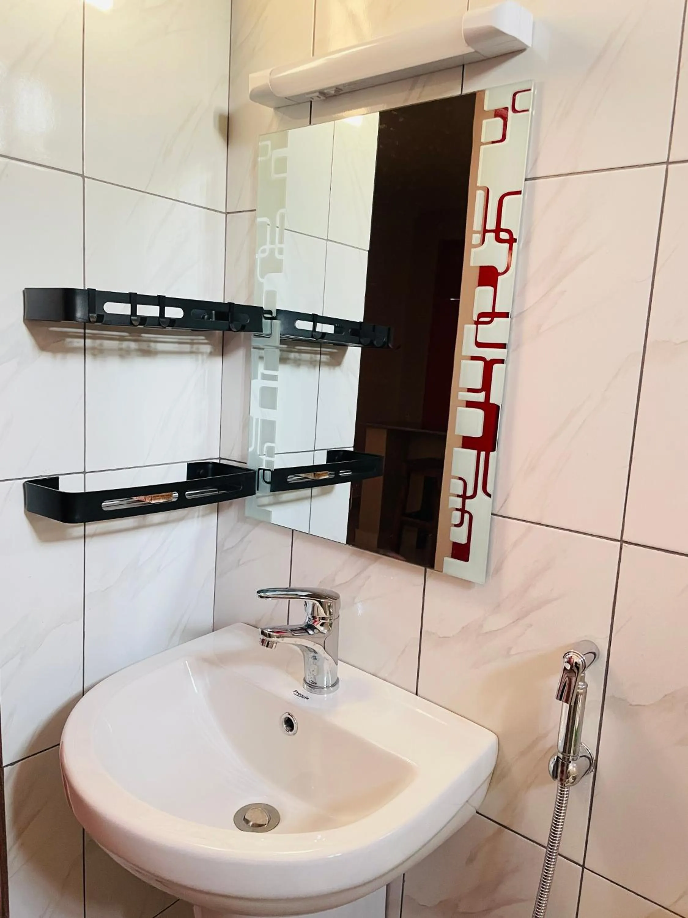 Shower in Mufasa city Hostel and Apartments