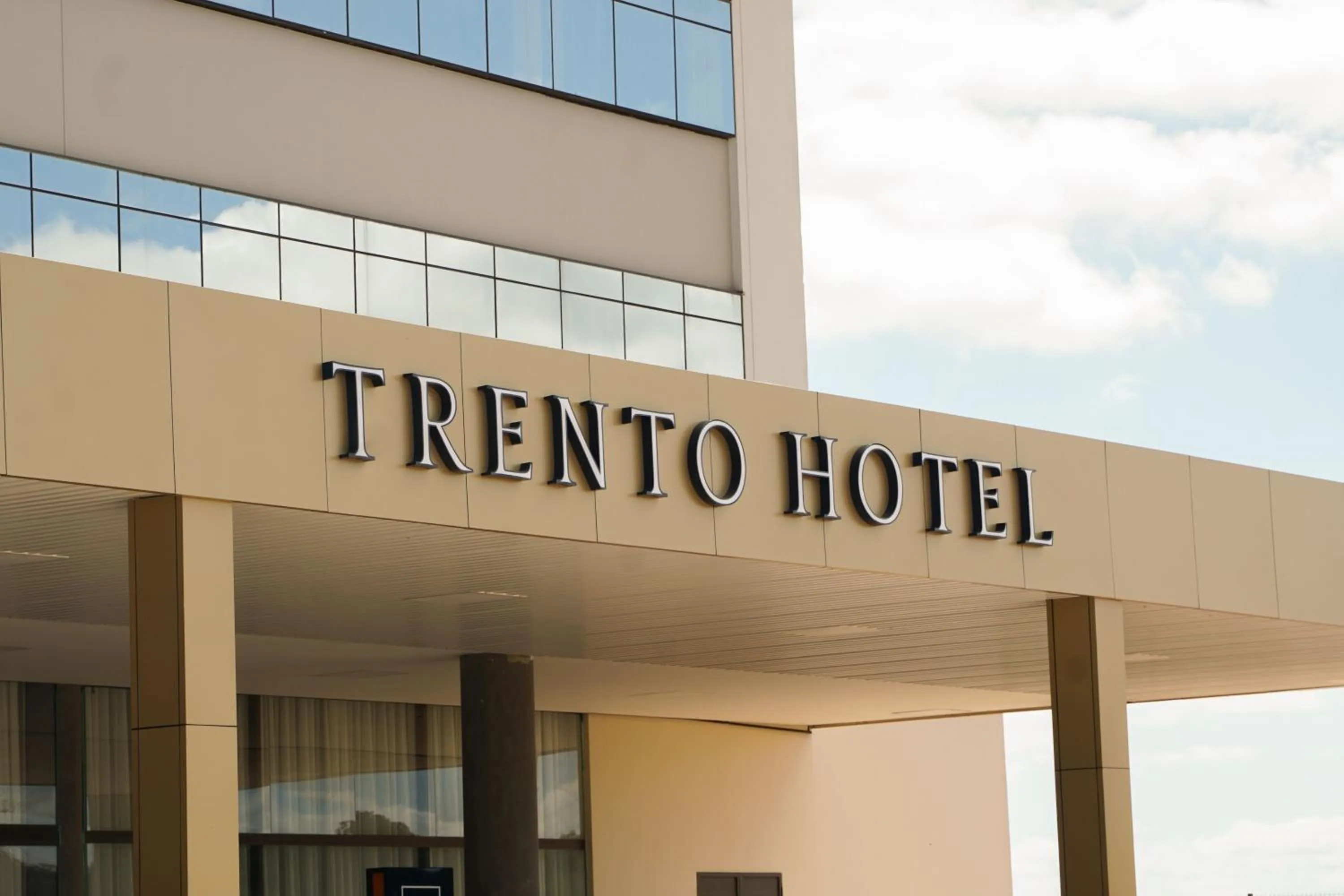 Property logo or sign in Trento Hotel Guaíra by Unna