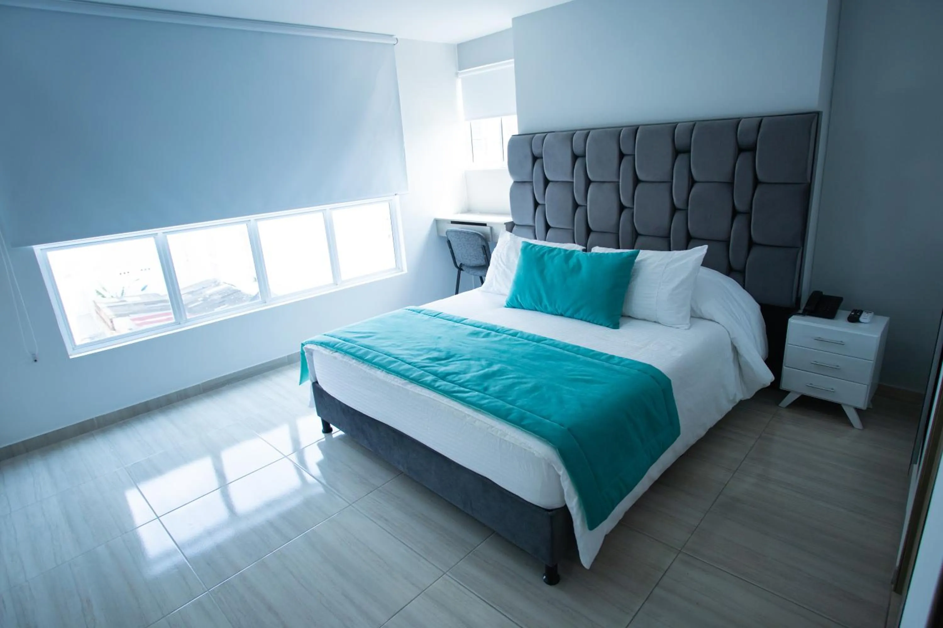 Bed in Street 55 Hotel