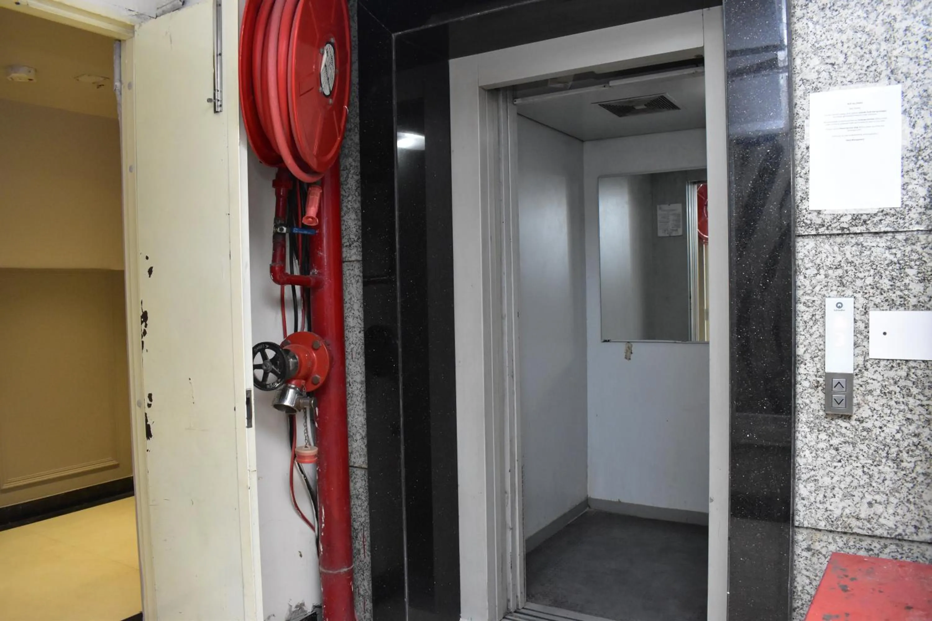 elevator in Qotel Comfort Golden Saffron Punjabi Bagh New Delhi