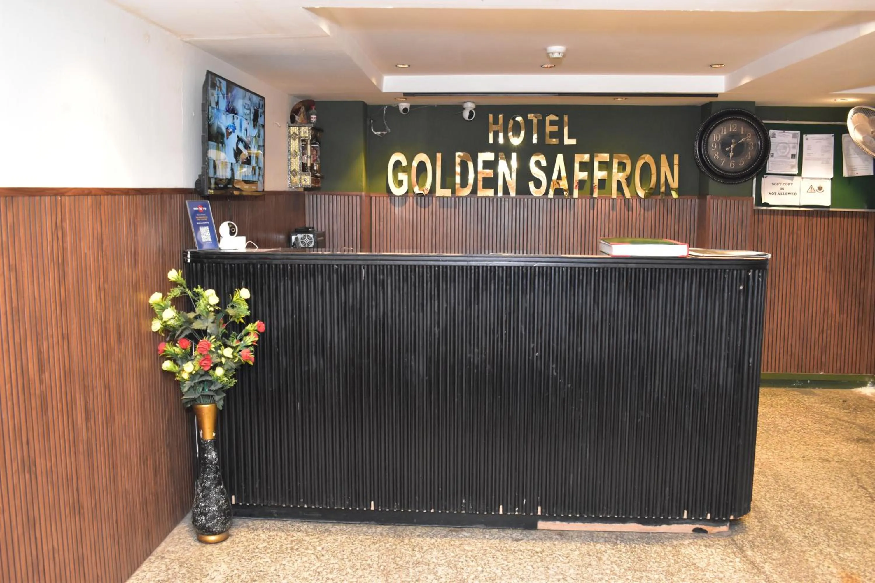 Property logo or sign in Qotel Comfort Golden Saffron Punjabi Bagh New Delhi