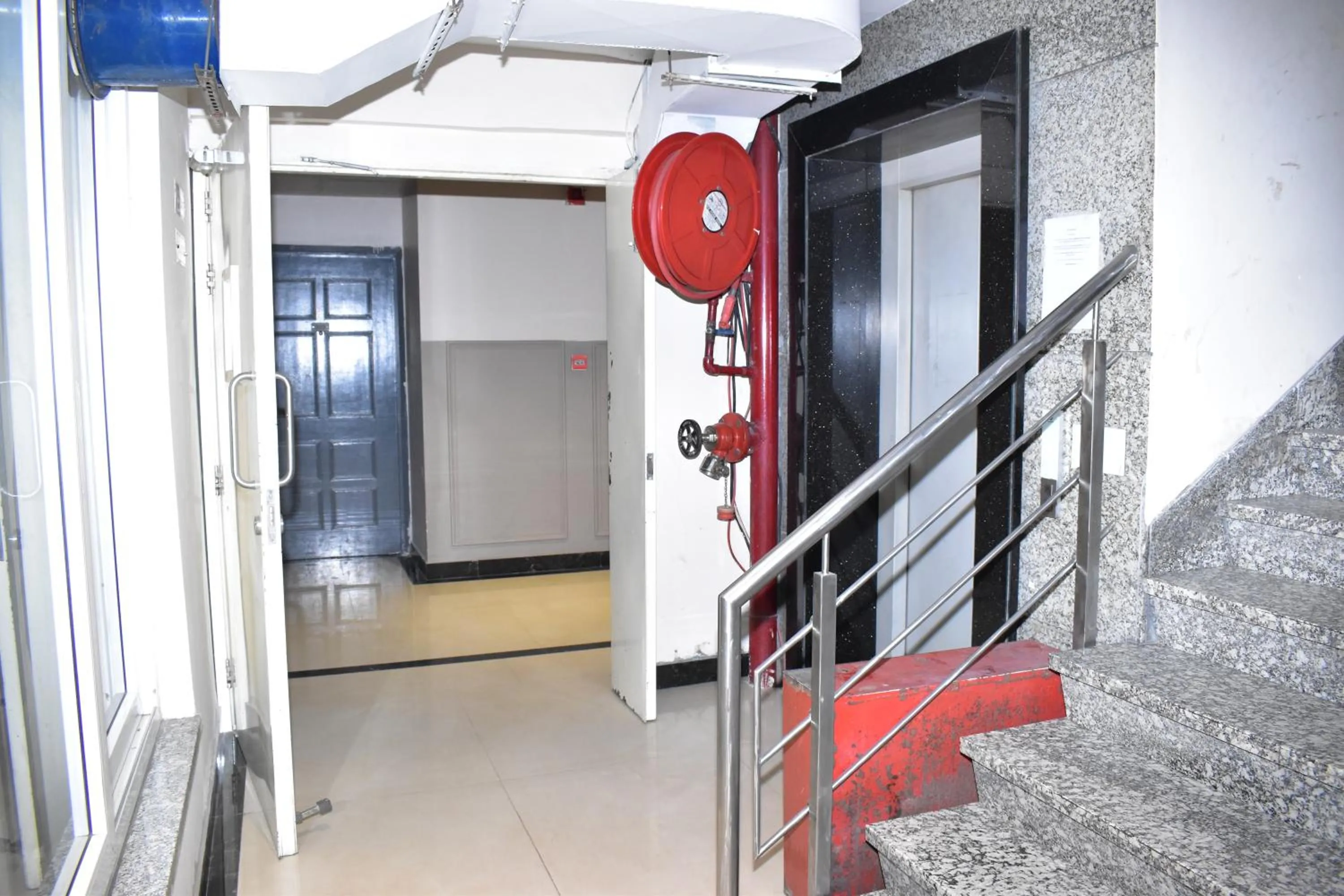 elevator in Qotel Comfort Golden Saffron Punjabi Bagh New Delhi