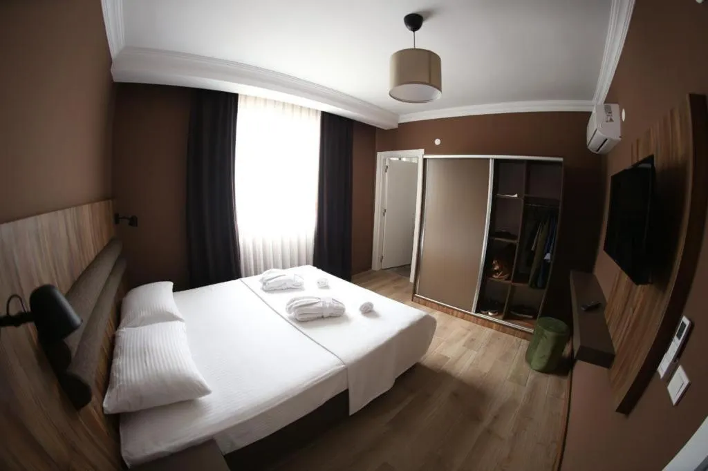 Bed in Yücemek Apart