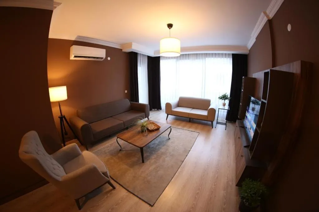 Communal lounge/ TV room in Yücemek Apart