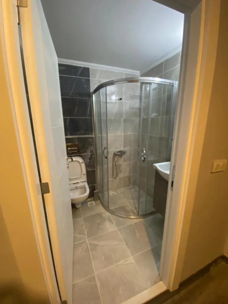 Shower in Yücemek Apart