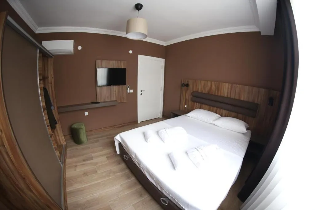 Communal lounge/ TV room, Bed in Yücemek Apart