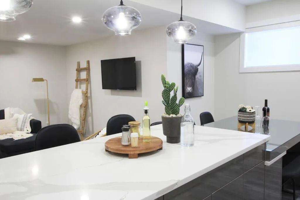 TV and multimedia in Executive Bsmt Suite, King Bed, 5 min to DT & Whyte Ave, Sleeps 6!