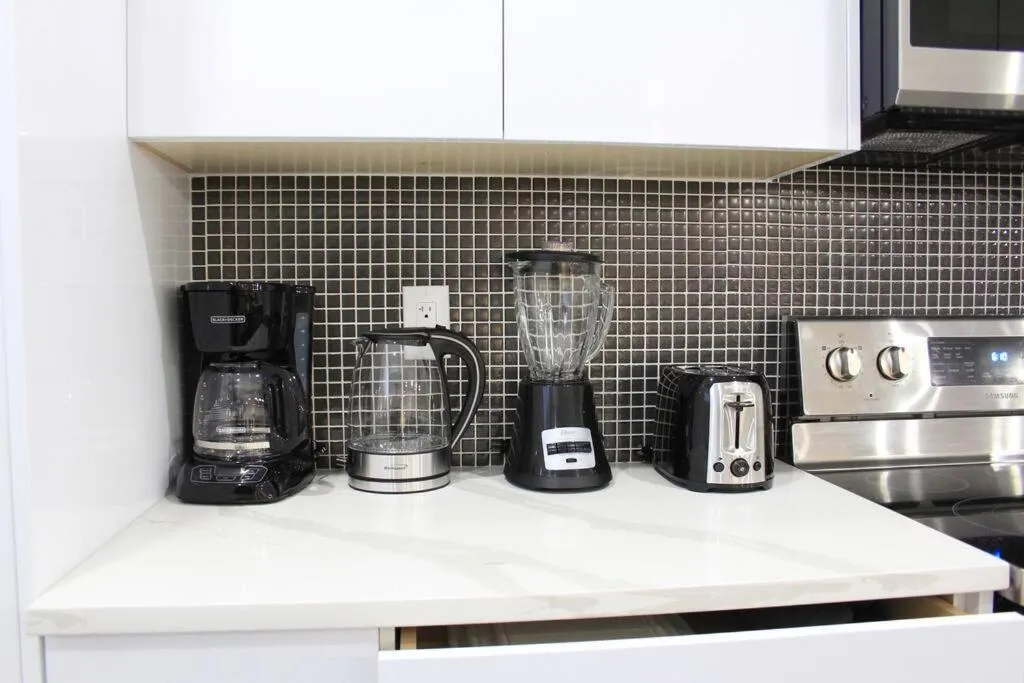 Coffee/tea facilities in Executive Bsmt Suite, King Bed, 5 min to DT & Whyte Ave, Sleeps 6!