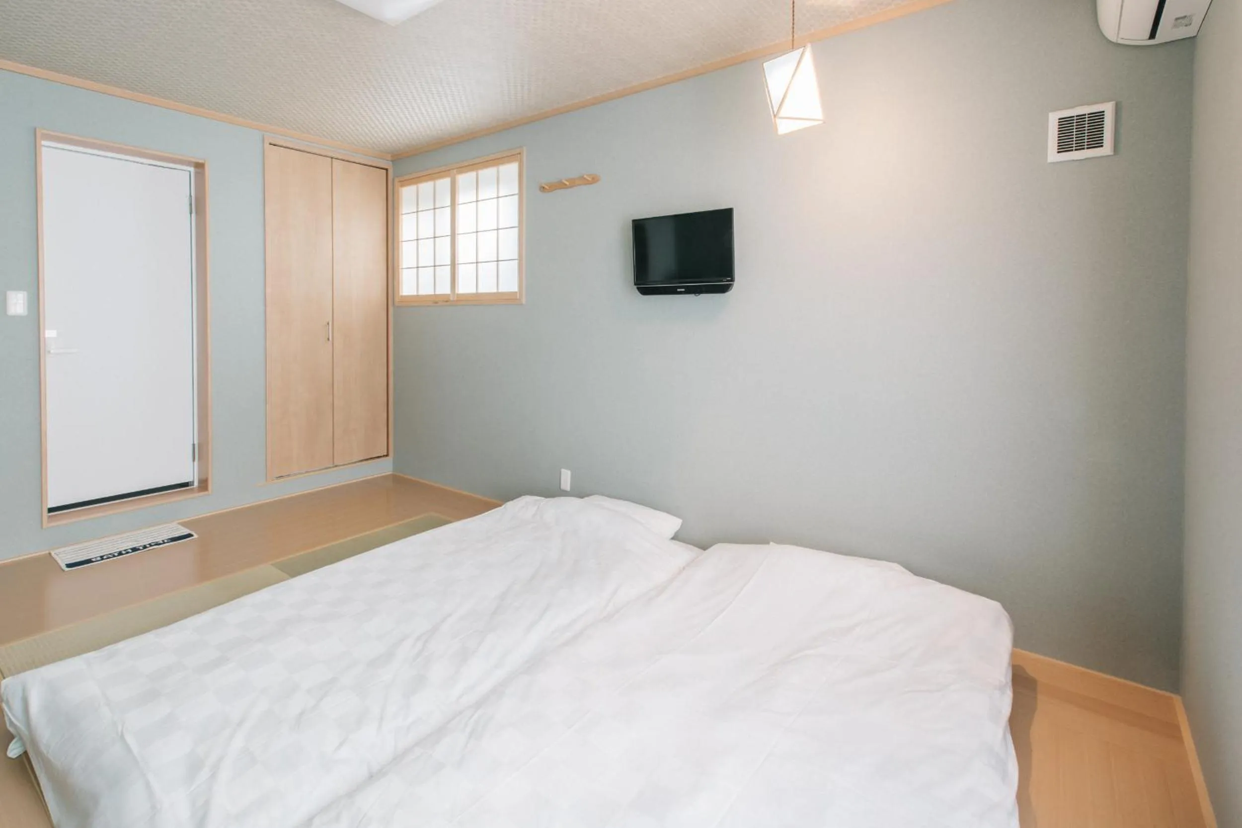 Bed in Kyoto KaedeHotel Kamogawa