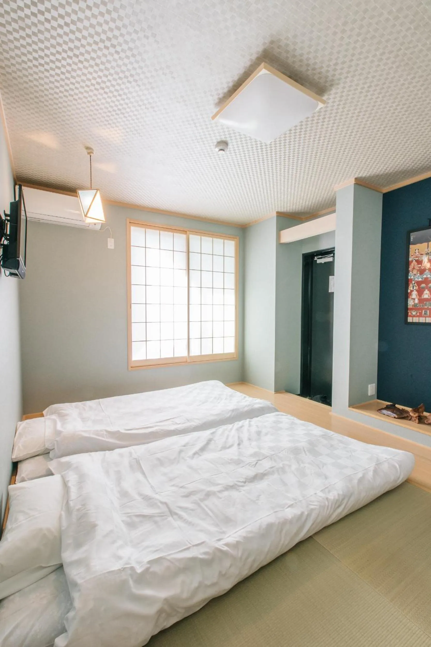 Bed in Kyoto KaedeHotel Kamogawa