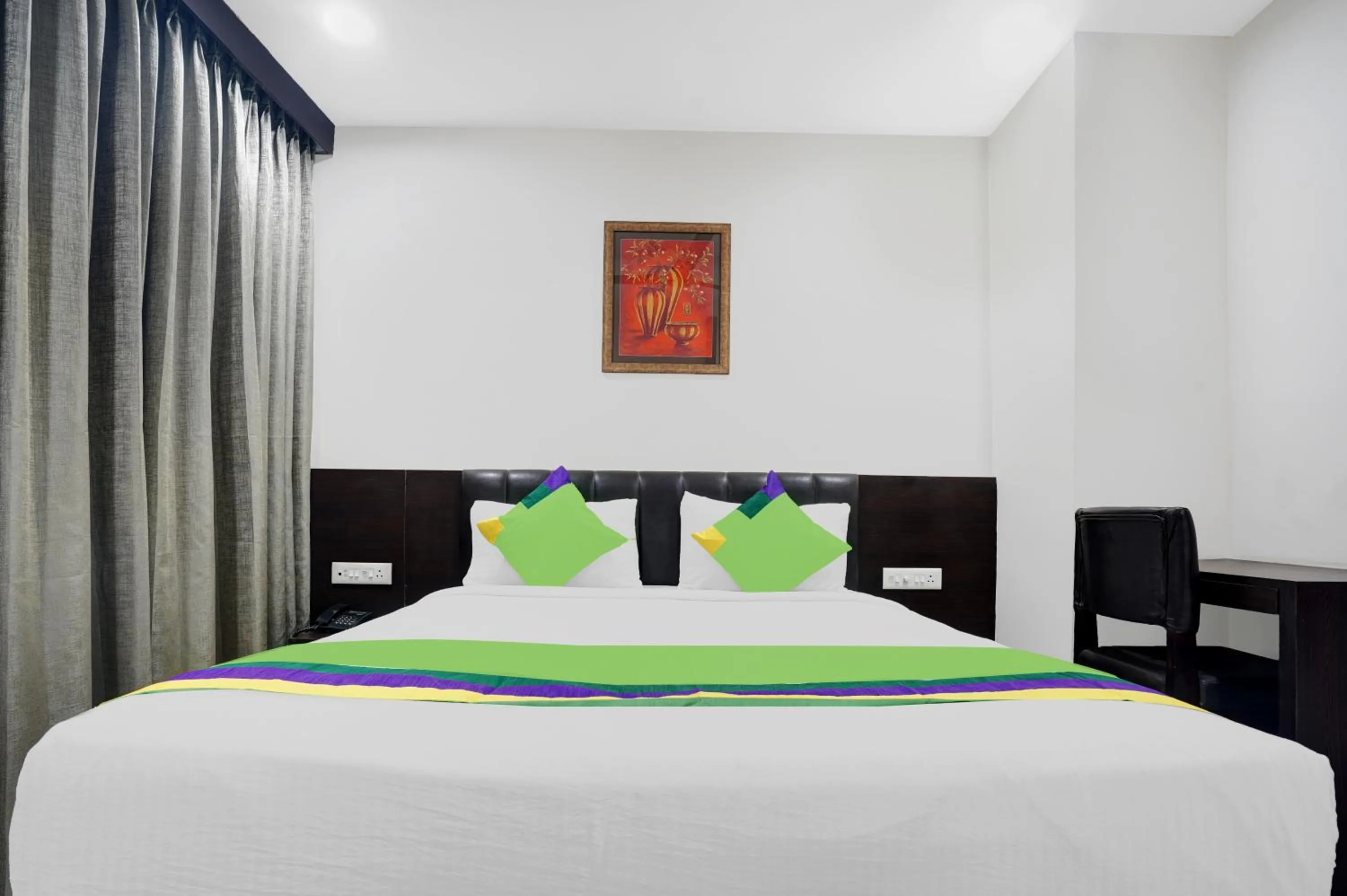 Bedroom in Treebo Madhuvan Grand