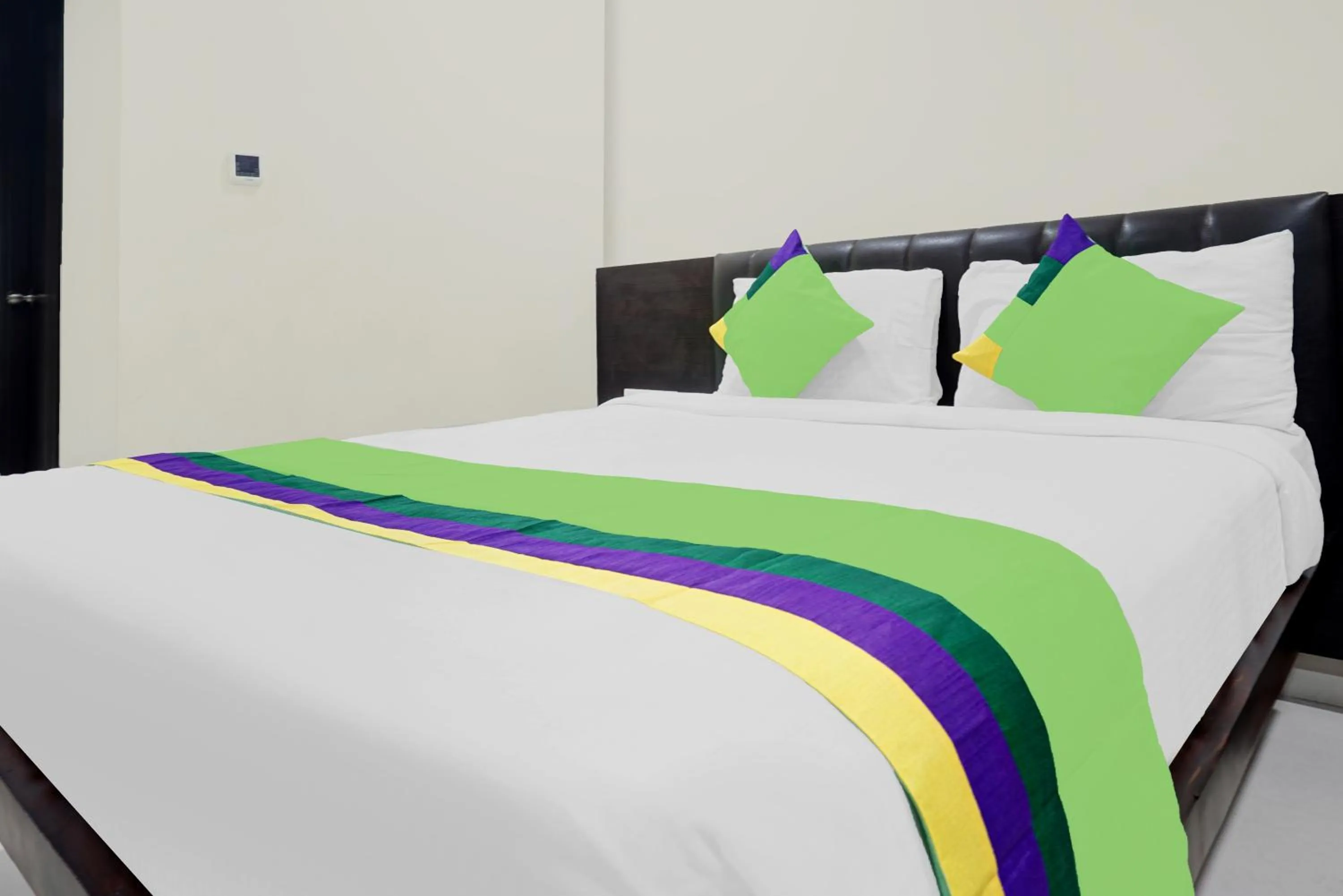 Bedroom in Treebo Madhuvan Grand