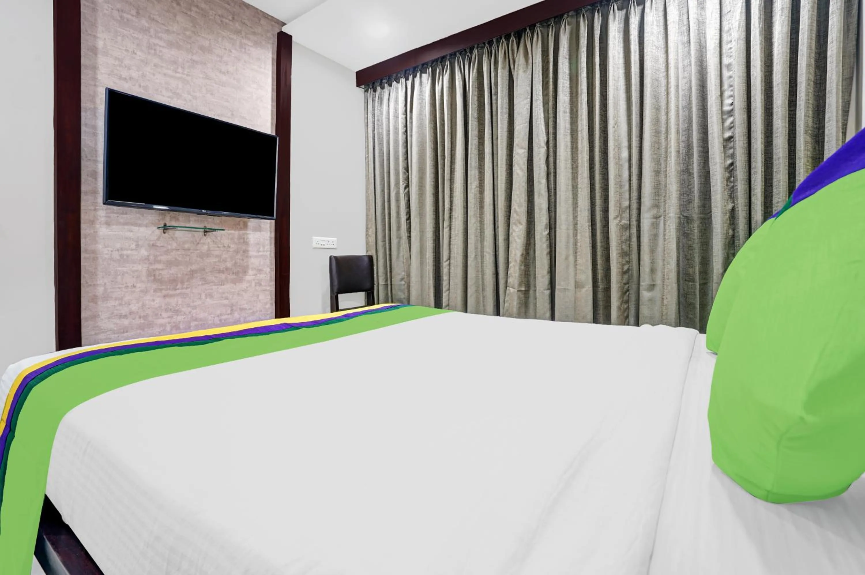 Bedroom in Treebo Madhuvan Grand