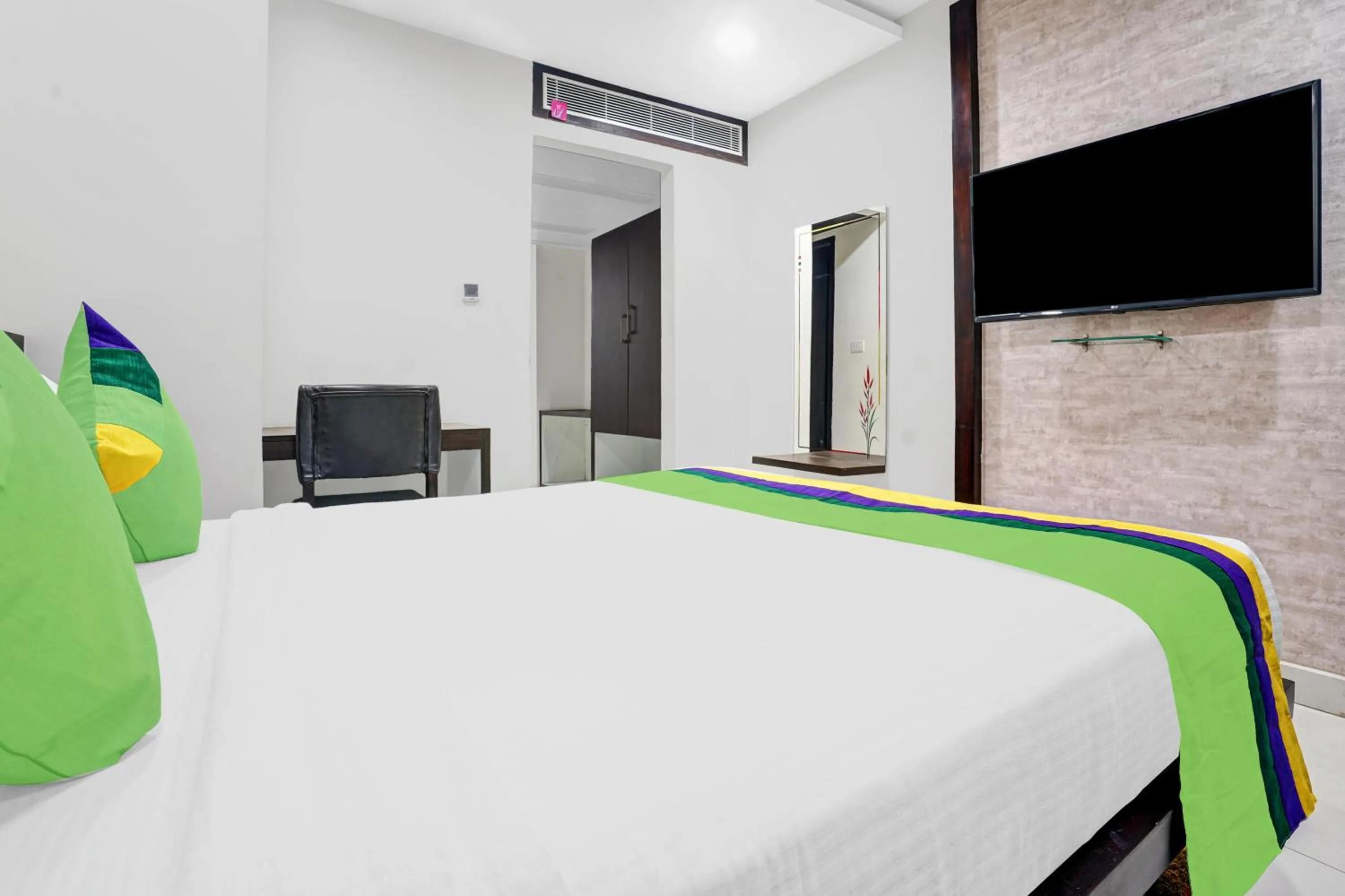 Bedroom in Treebo Madhuvan Grand